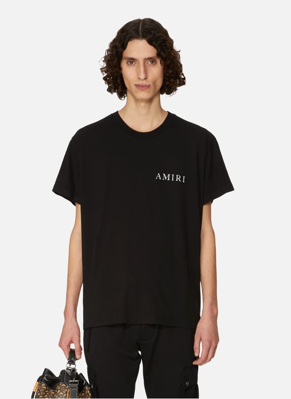 T-shirt à logo imprimé Noir by AMIRI AMIRI T-shirt à logo imprimé Noir