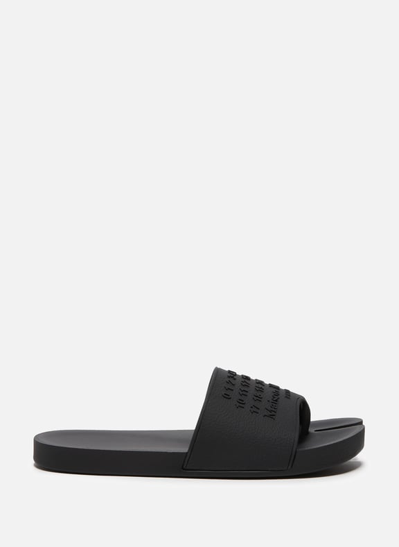 Claquettes à logo Noir by MAISON MARGIELA MAISON MARGIELA Claquettes à logo Noir