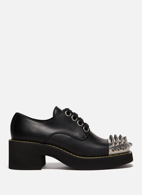 Derbies top noires cloutées