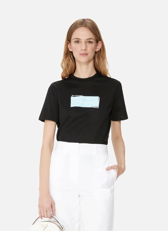 T-shirt en coton imprimé logo Noir by PRADA PRADA T-shirt en coton imprimé logo Noir