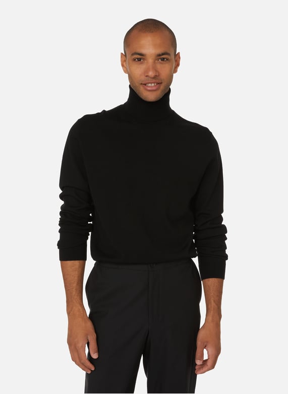 Pull col roulé noir homme sale