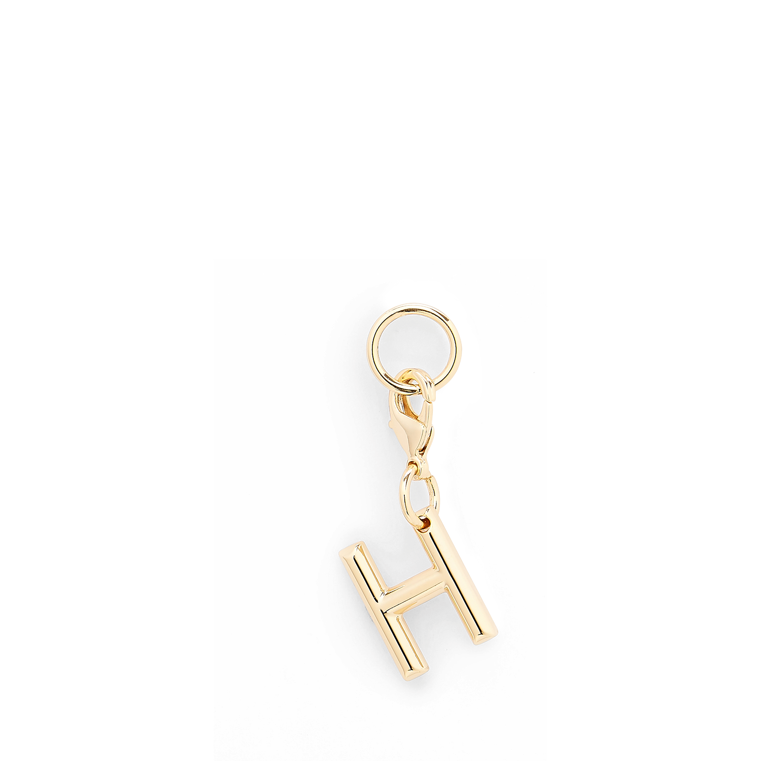 Gouden metalen Lancel-bedel in de vorm van de letter H, met een gepolijste afwerking. LANCEL Goud