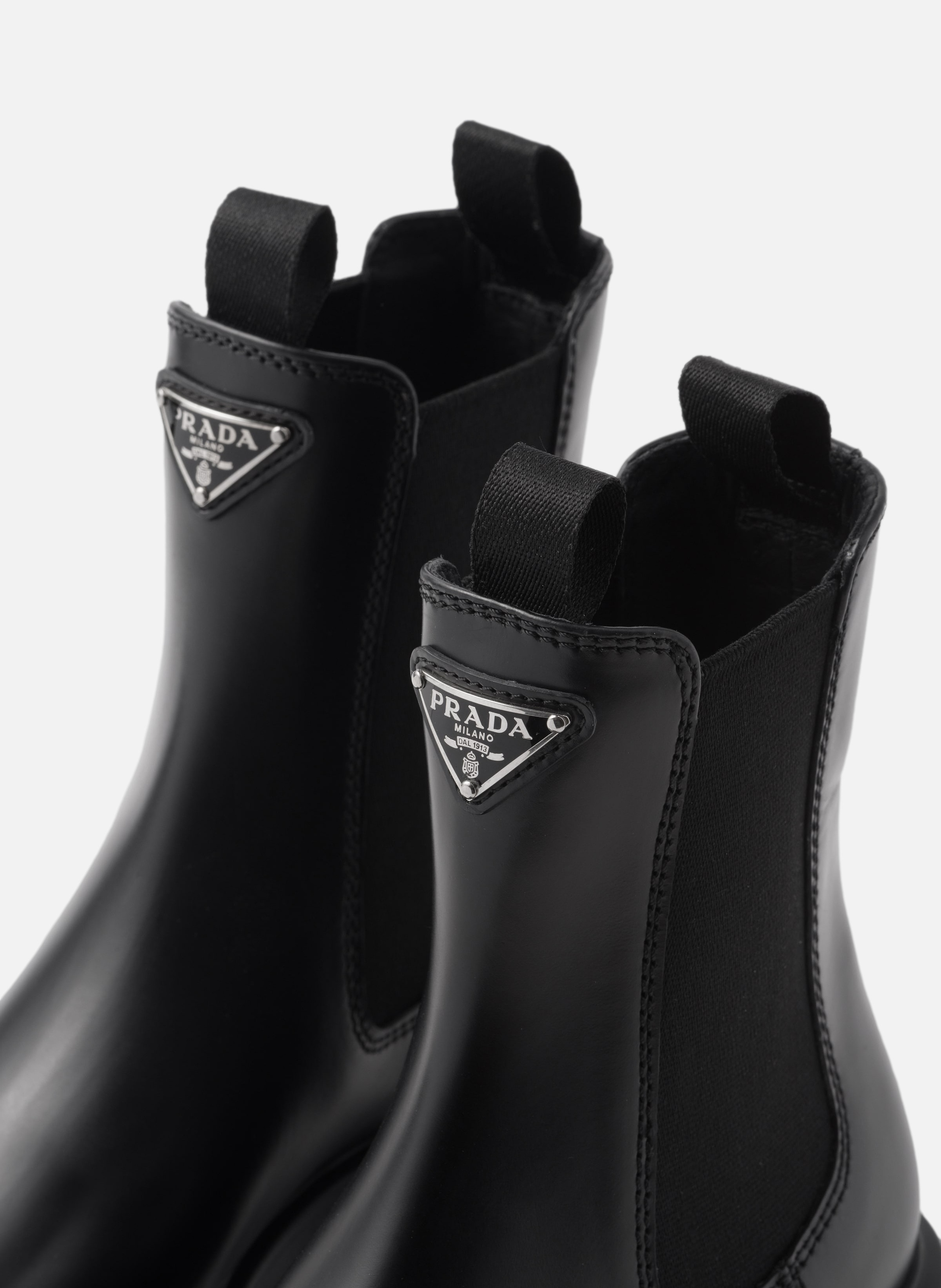 Bottines monolith en cuir brossé PRADA Noir