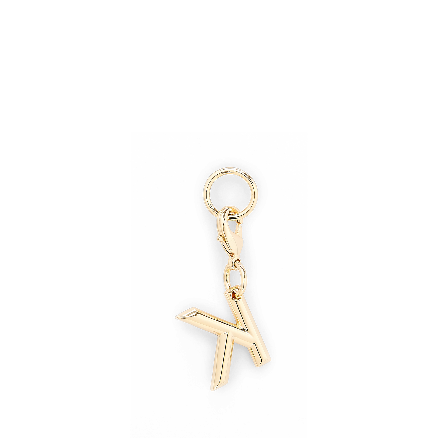 Lancel-bedeltje in de vorm van de letter K, goudkleurig metaal, gepolijste afwerking. LANCEL Goud