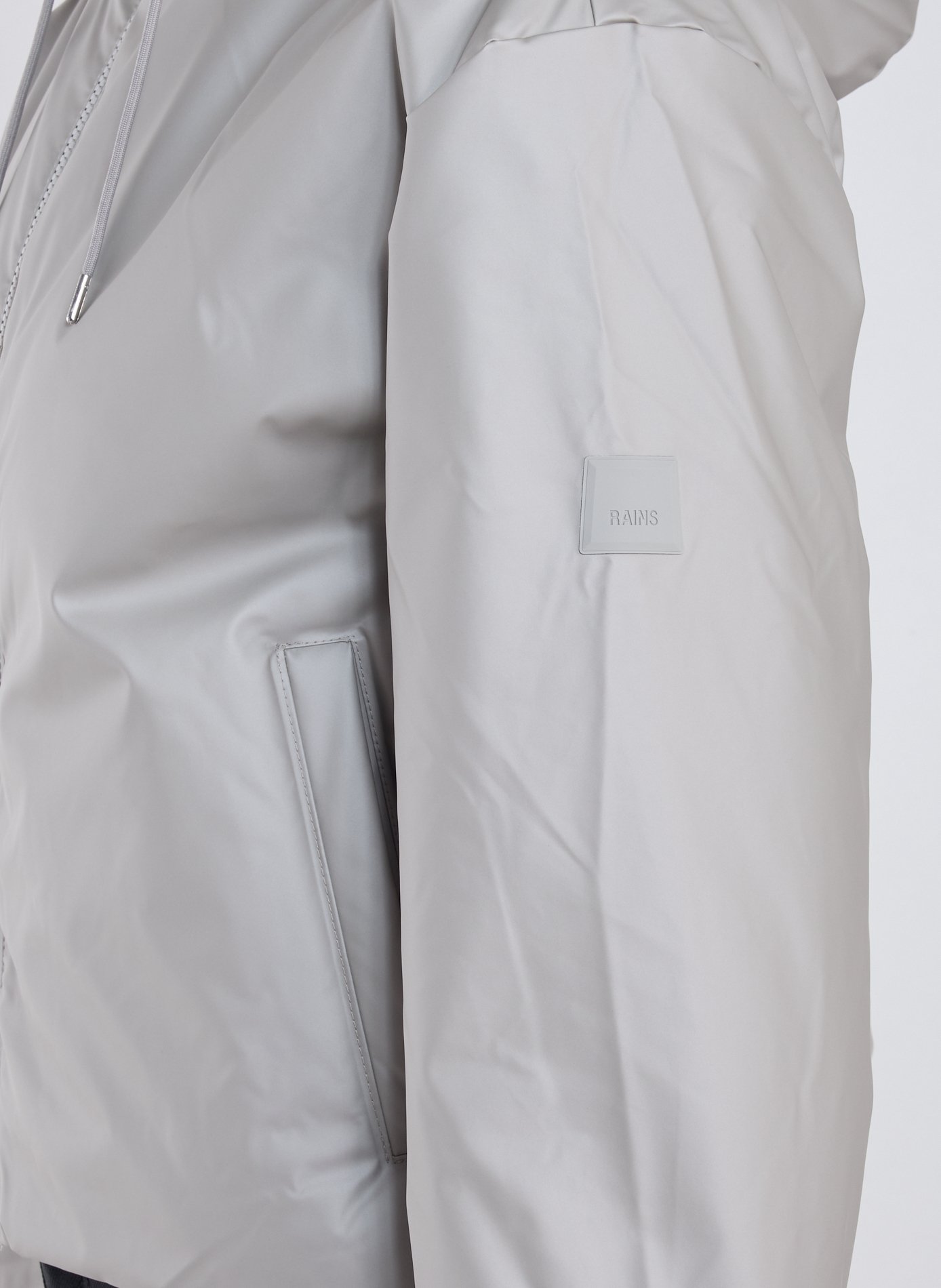 Veste matelassée à capuche RAINS Gris