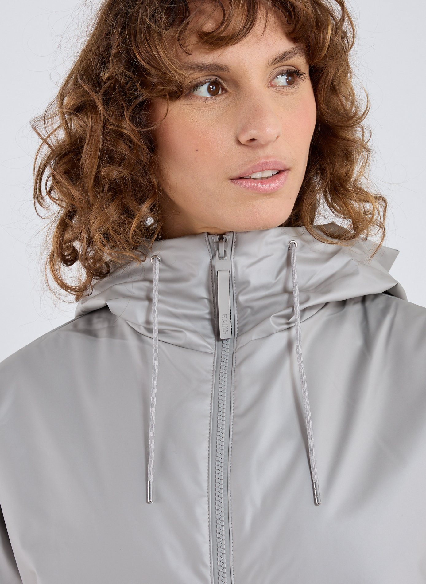 Veste matelassée à capuche RAINS Gris