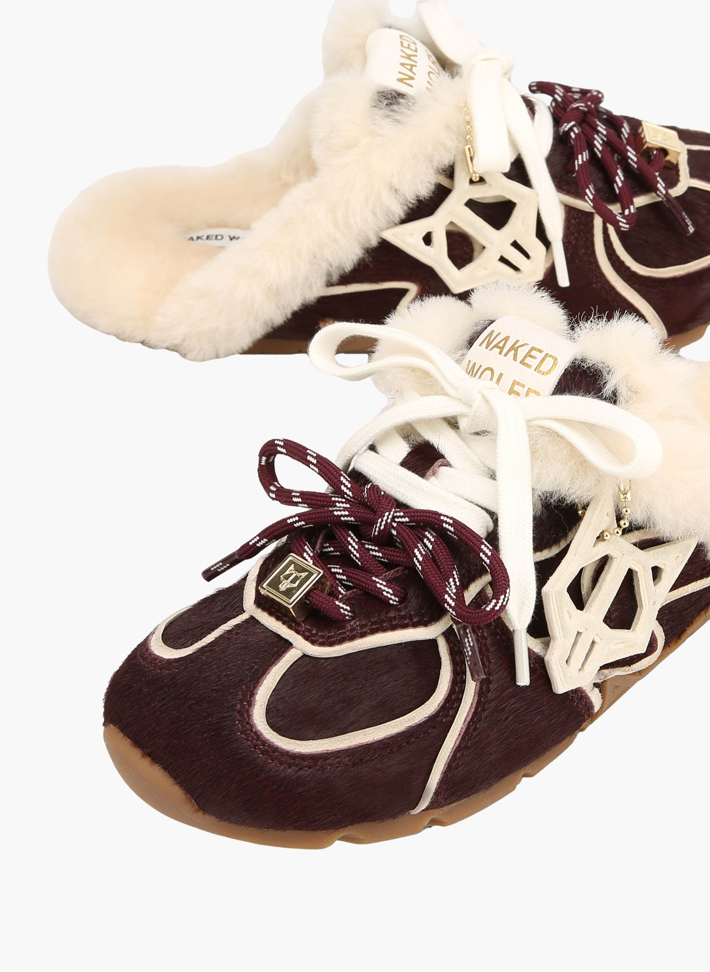 Mules met opvallende details van ponyhaarleer NAKED WOLFE Rood