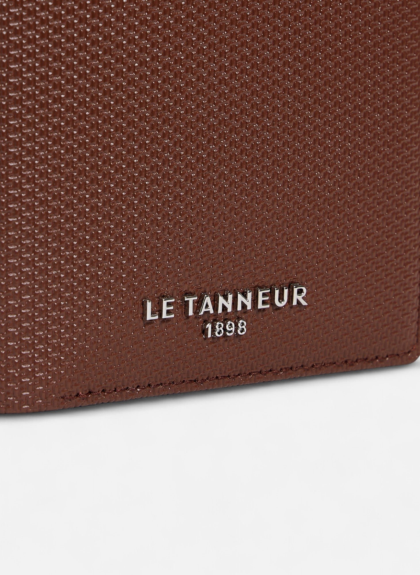 Portefeuille vertical zippé emile en cuir signature t Marron