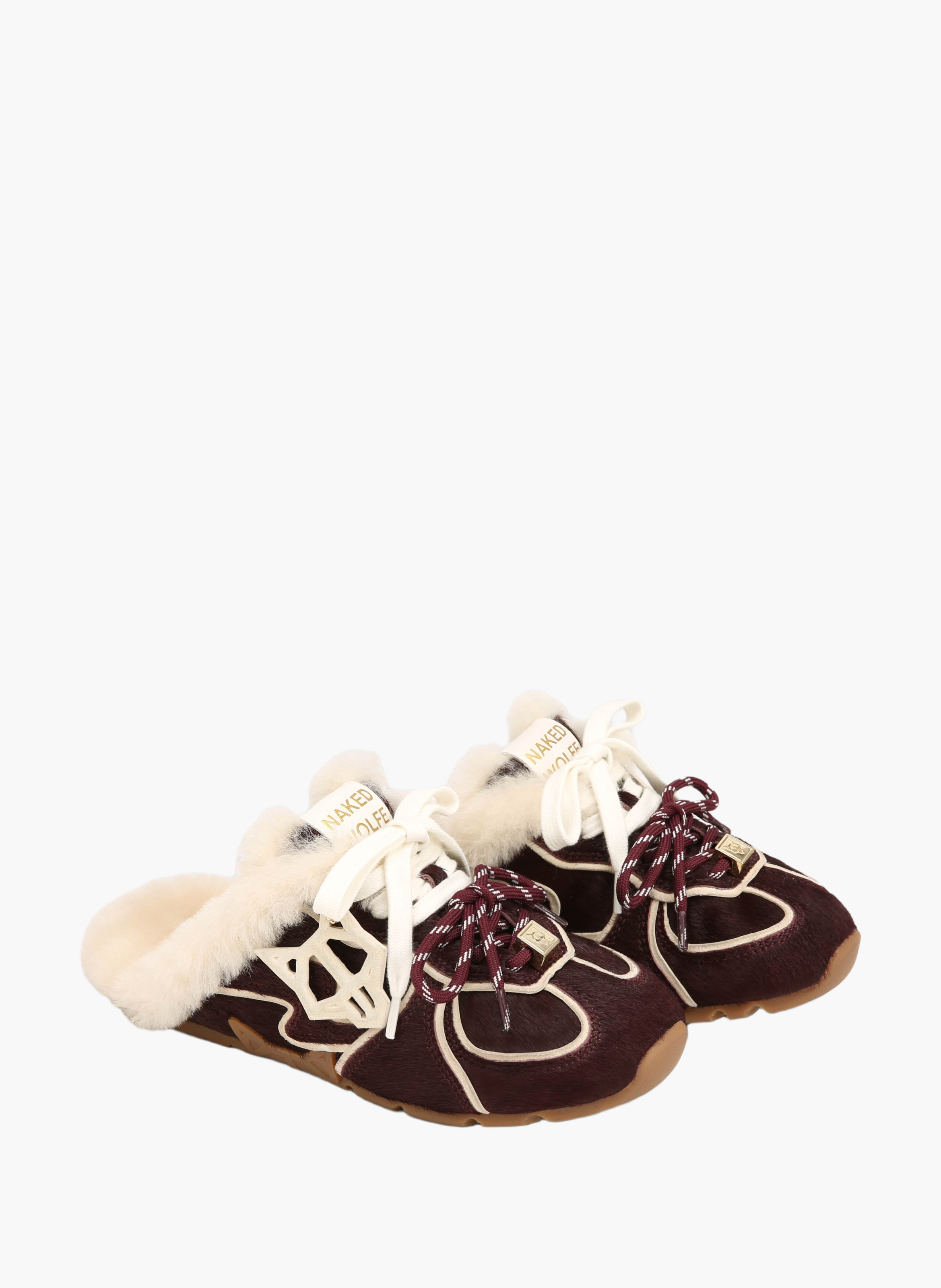 Mules met opvallende details van ponyhaarleer NAKED WOLFE Rood