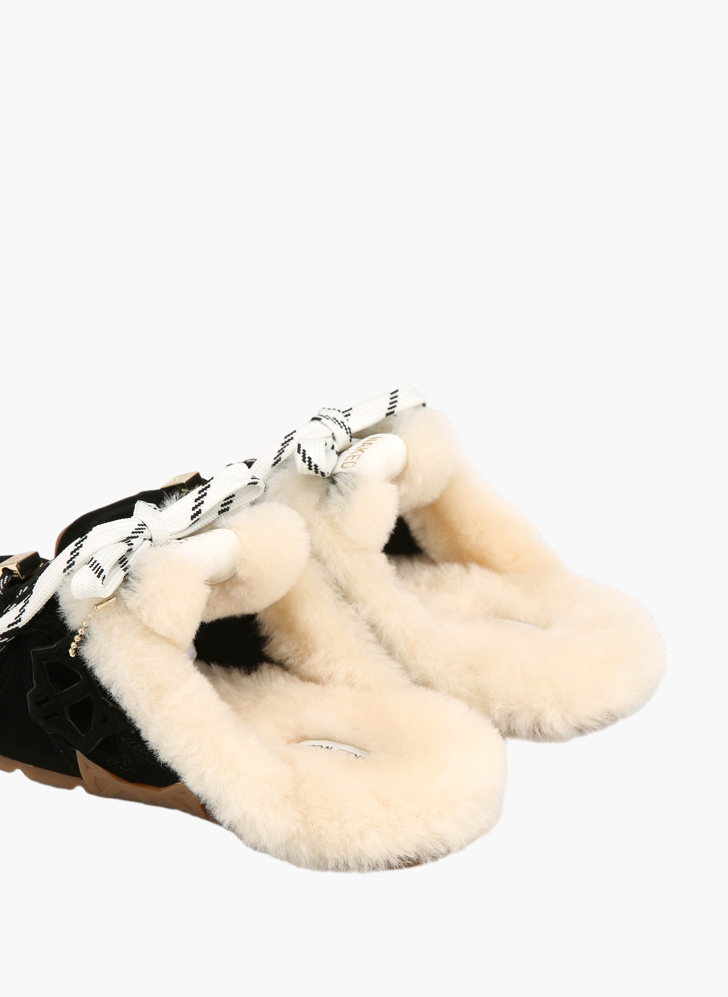 Mules met opvallende details van ponyhaarleer NAKED WOLFE Rood
