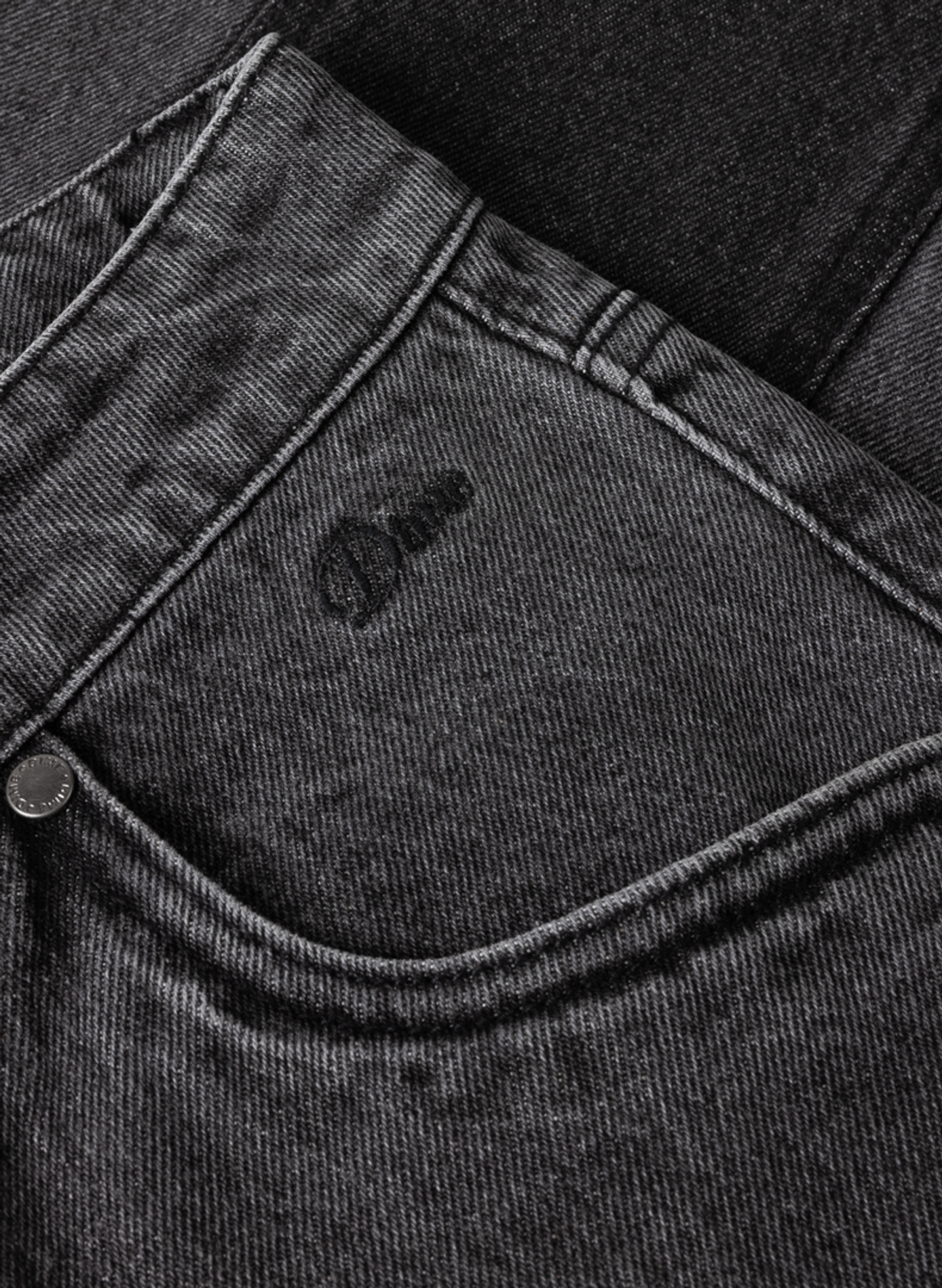 Jean à empiècement contrastant et poche brodée DIME Black