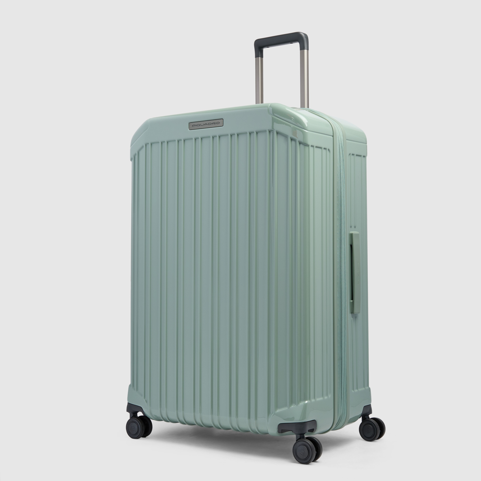Uitbreidbare koffer met 4 wielen voor ruimbagage PIQUADRO Groen