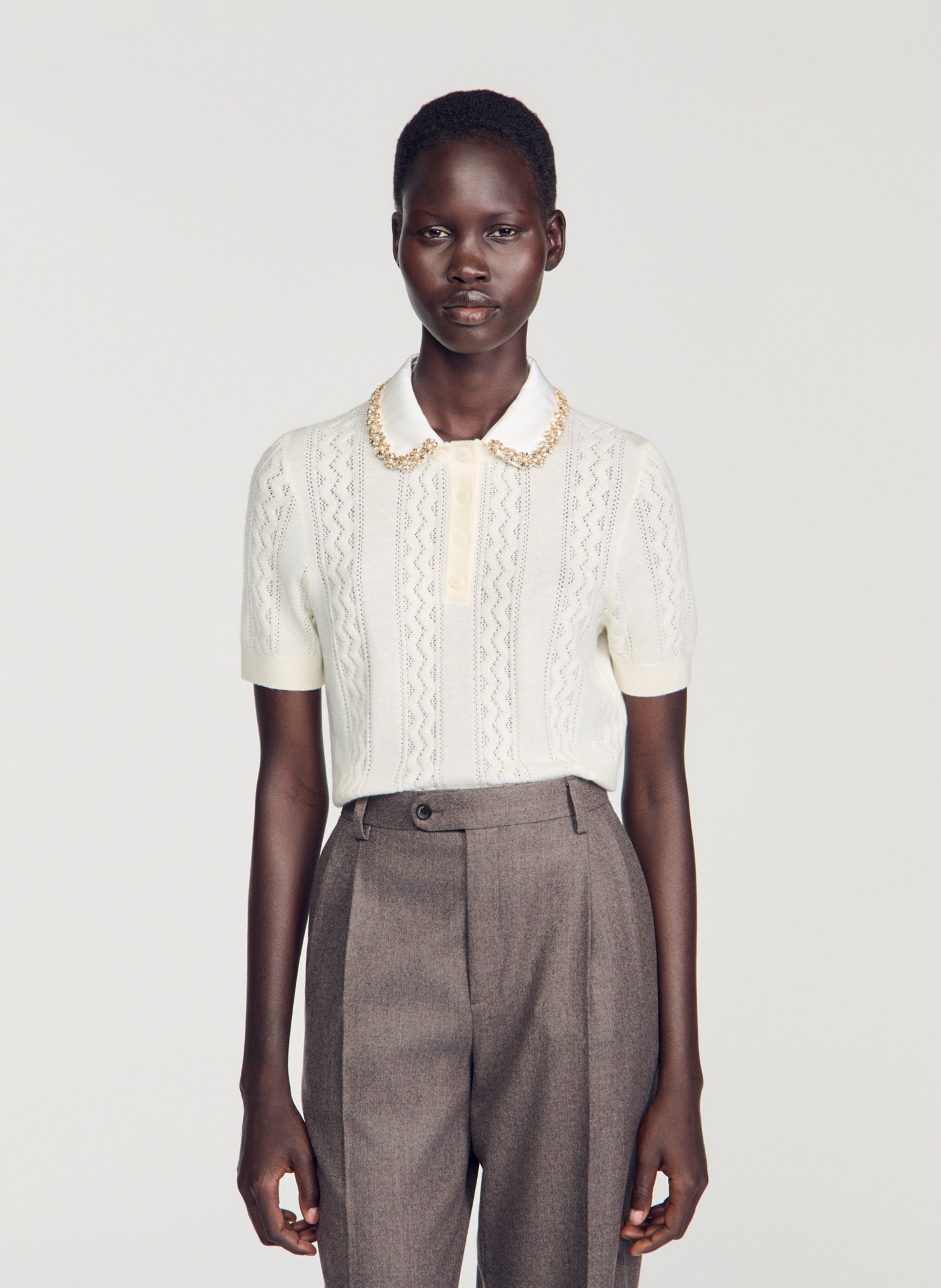 Polo ajusté en laine SANDRO Beige