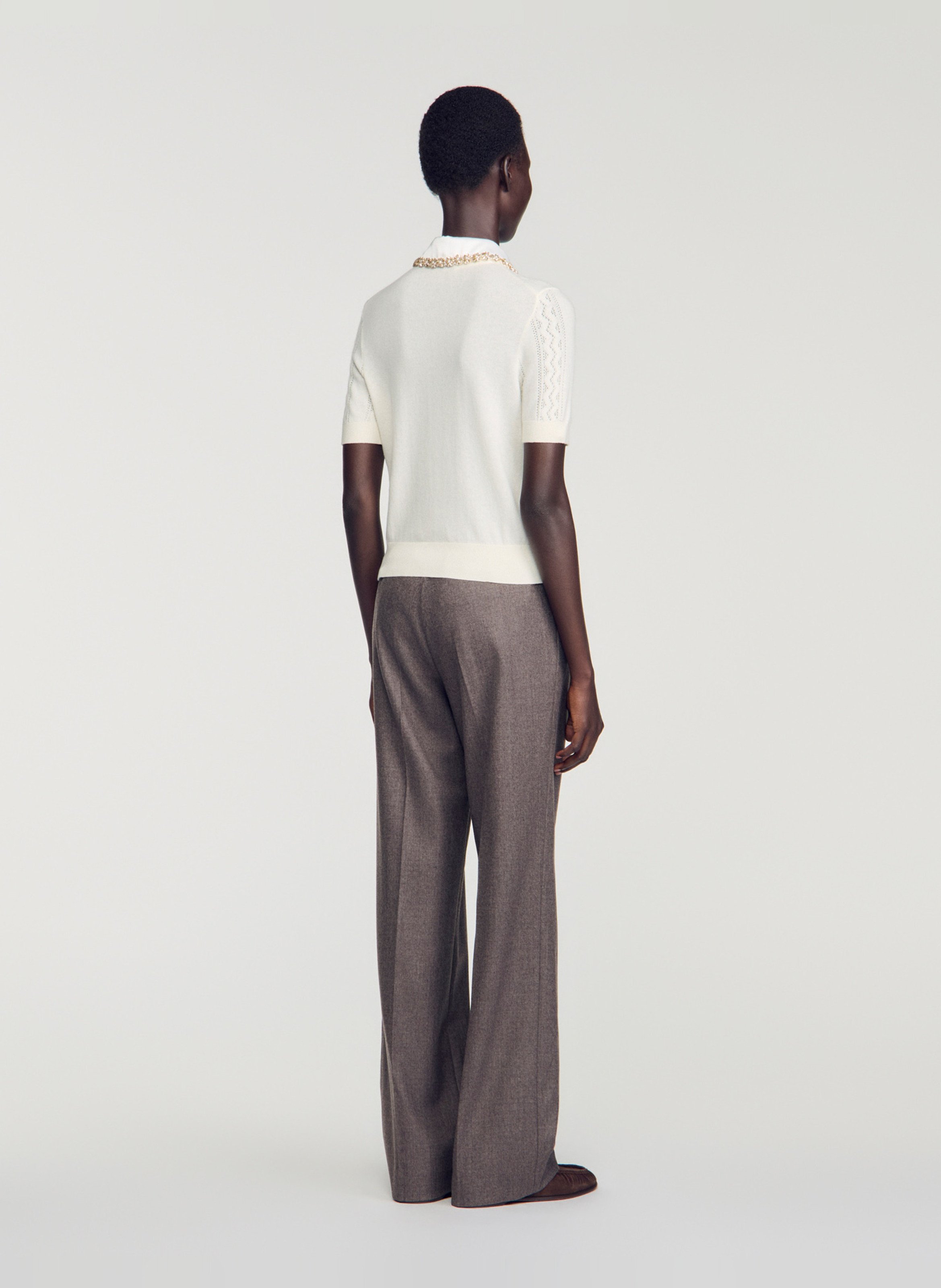 Polo ajusté en laine SANDRO Beige