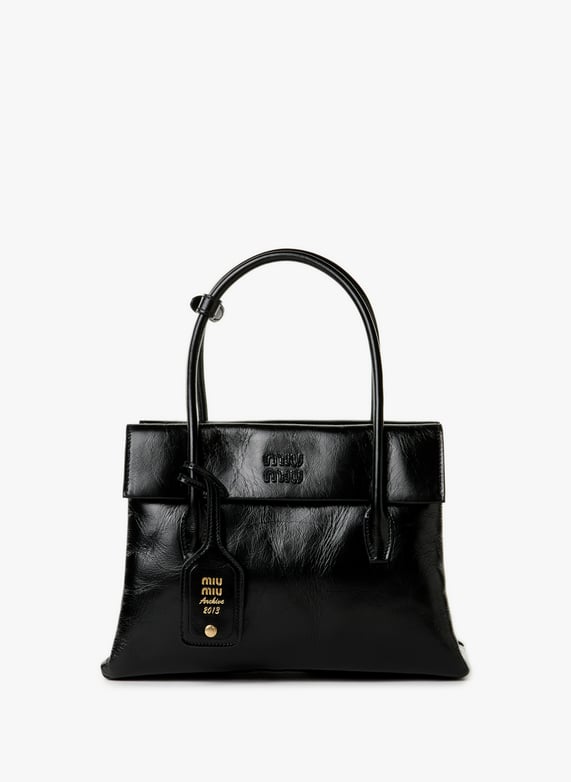 Sac à main Solitaire en cuir brillant | Noir by MIU MIU Sac à main Solitaire en cuir brillant Noir