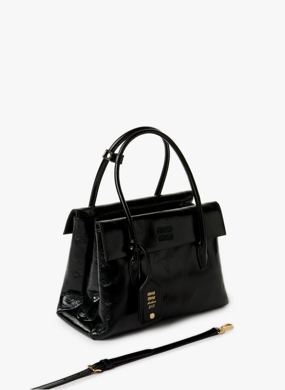 Sac à main Solitaire en cuir brillant | Noir by MIU MIU Sac à main Solitaire en cuir brillant Noir