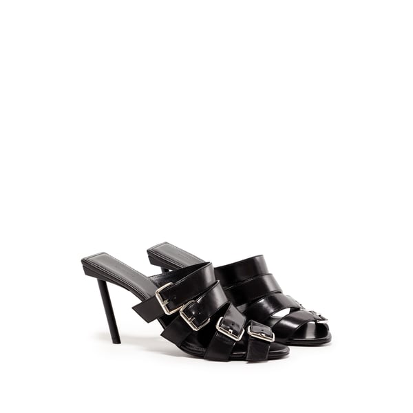 Mules à boucles en cuir