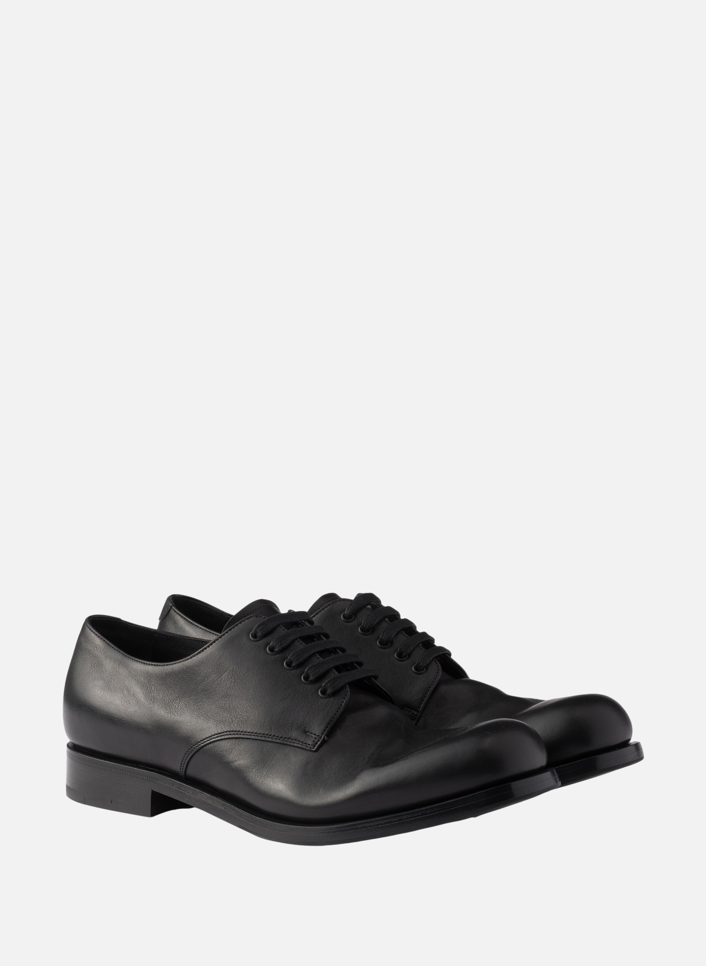 Derbies à lacets en cuir vieilli PRADA Noir