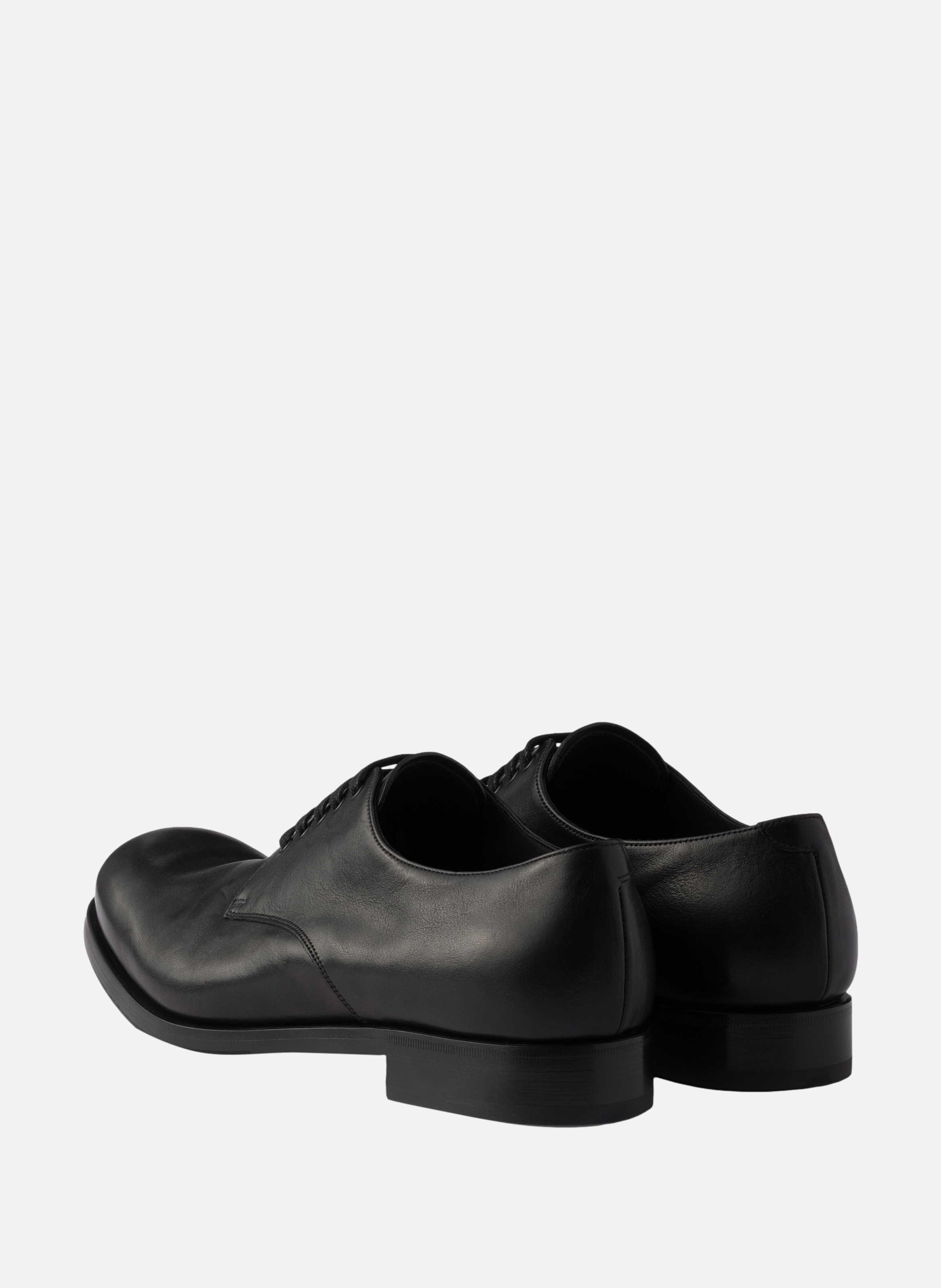 Derbies à lacets en cuir vieilli PRADA Noir