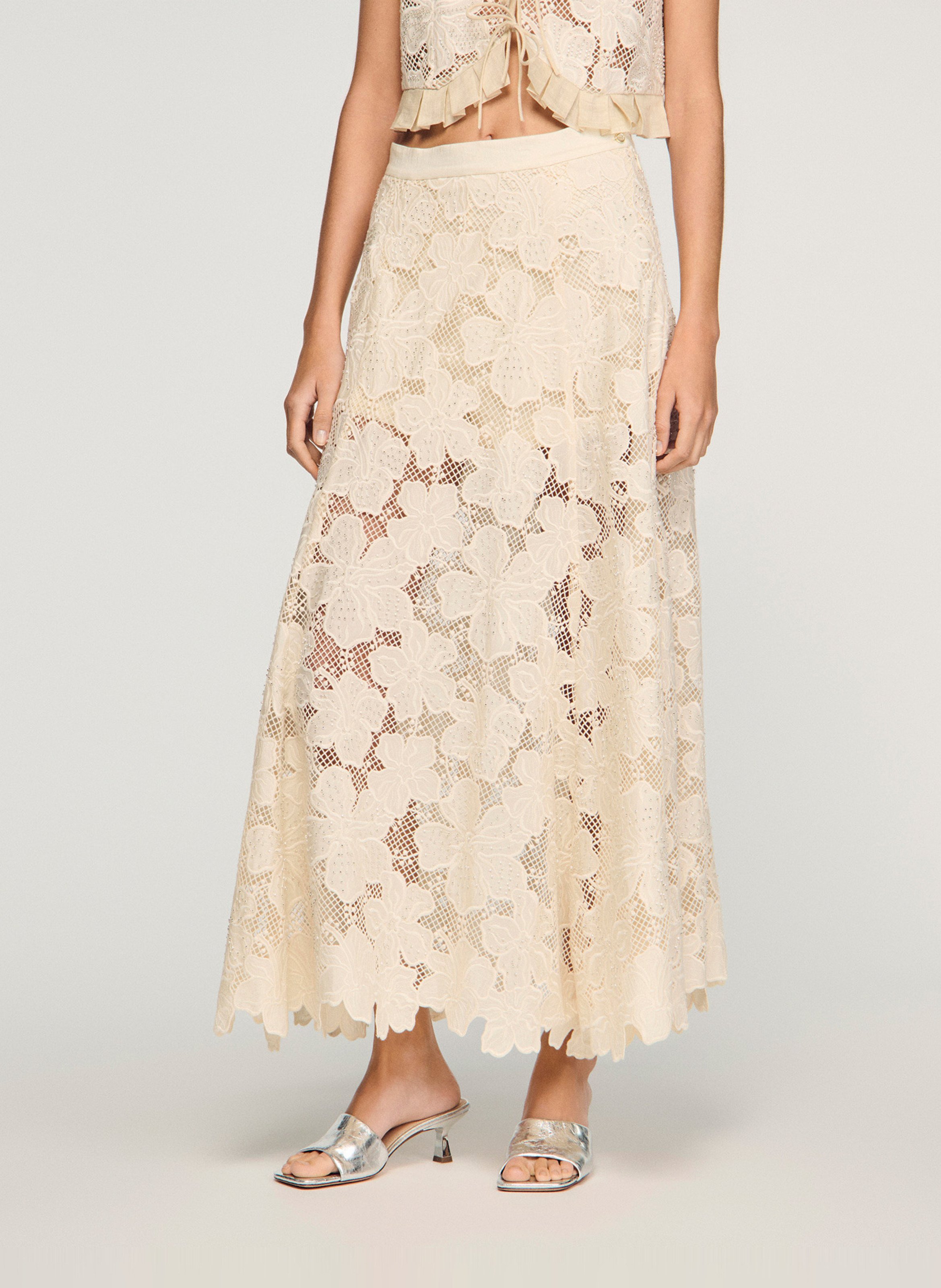 Jupe longue évasée en guipure SANDRO Beige