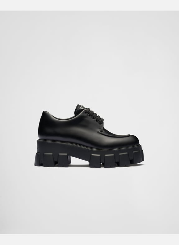 Chaussures à lacets monolith en cuir brossé Noir by PRADA PRADA Chaussures à lacets monolith en cuir brossé Noir