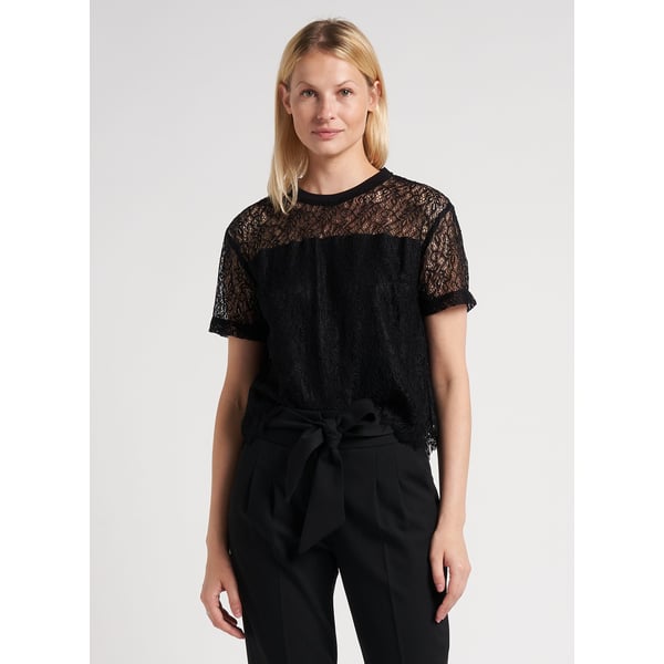 Top col rond en dentelle