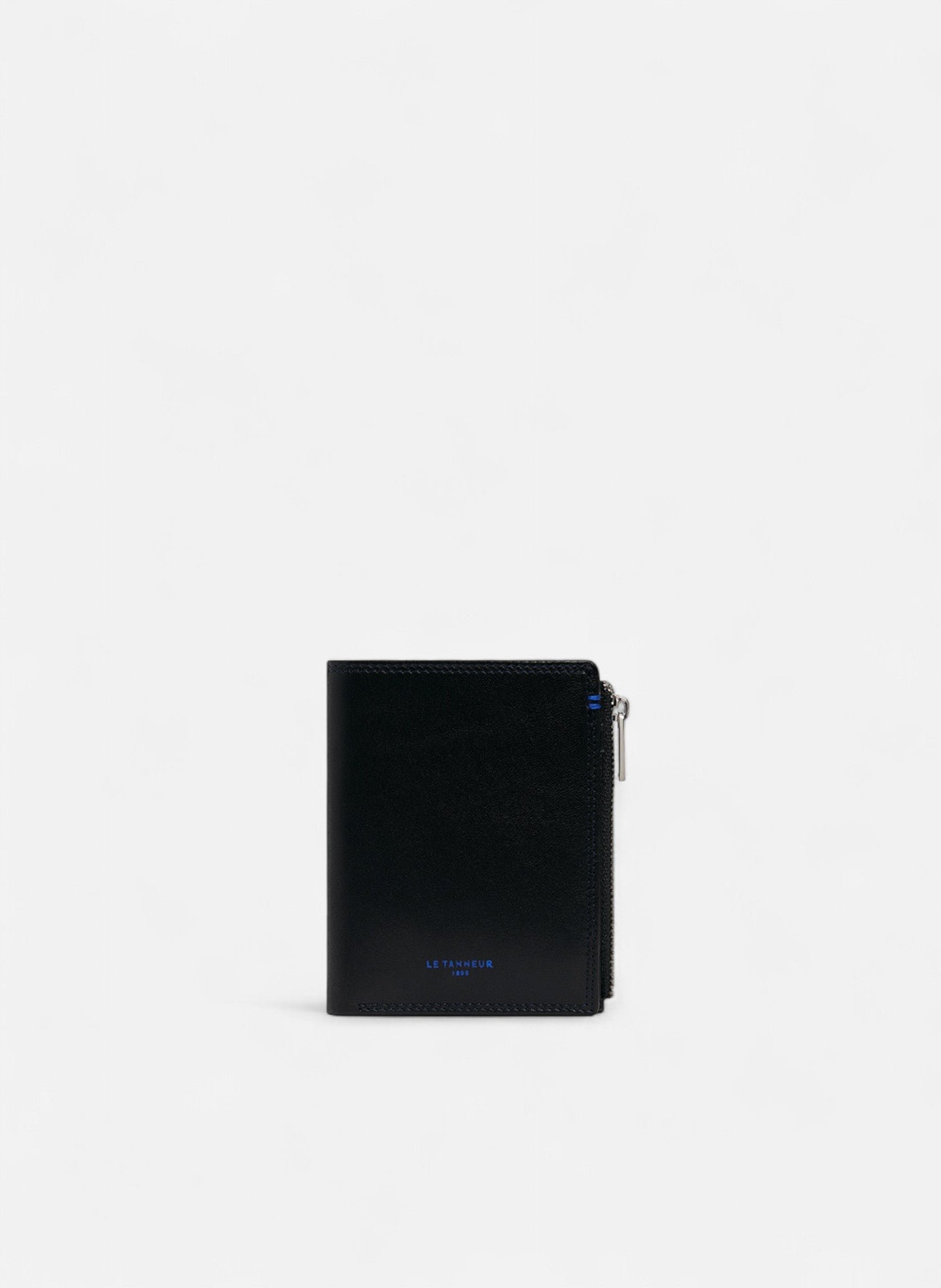 Portefeuille vertical zippé moyen modèle martin en cuir lisse NoirLE TANNEUR