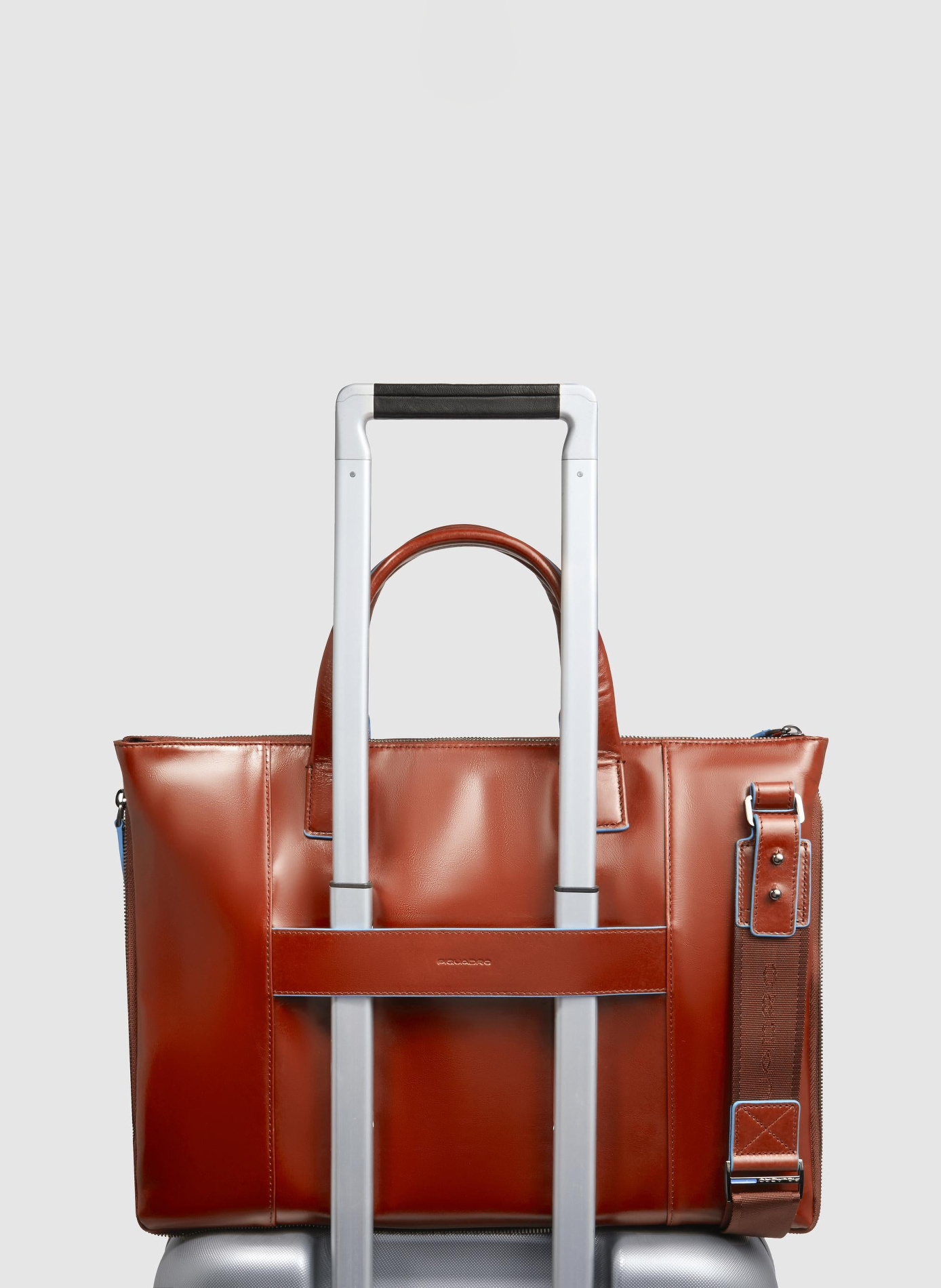 Expandable leather laptop bag 15.6" blue square | Brown PIQUADRO Men