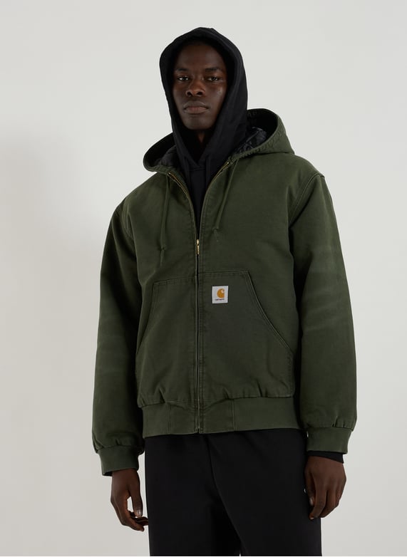Blouson ample à capuche en coton | Vert by CARHARTT WIP Blouson ample à capuche en coton Vert