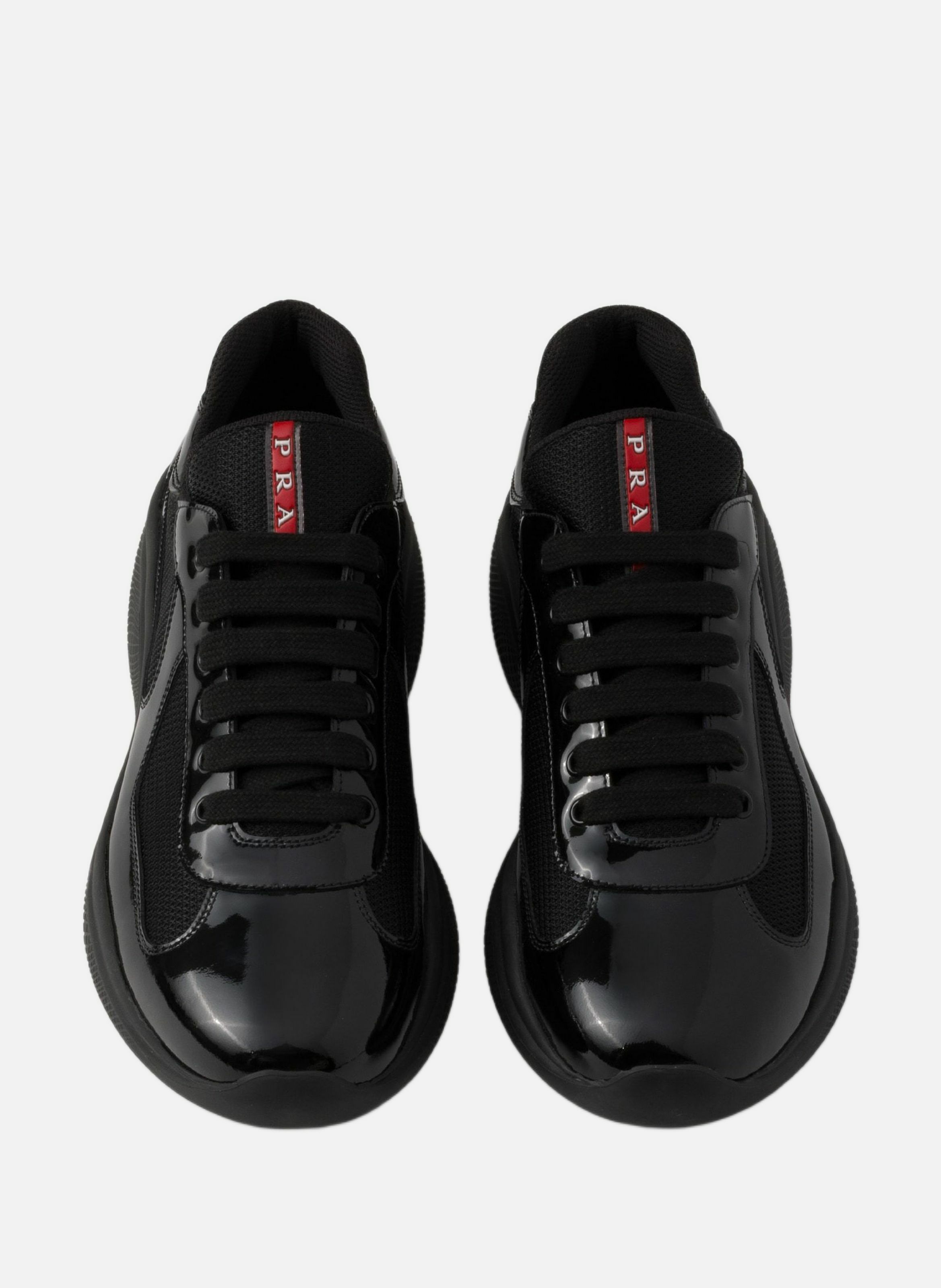 Sneakers prada america’s cup en cuir verni et tiss PRADA Noir
