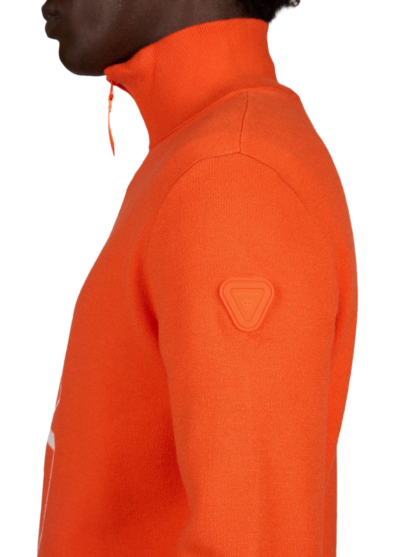 Straight-cut sweater with high collar and zippered pattern. GERTRUDE Orange