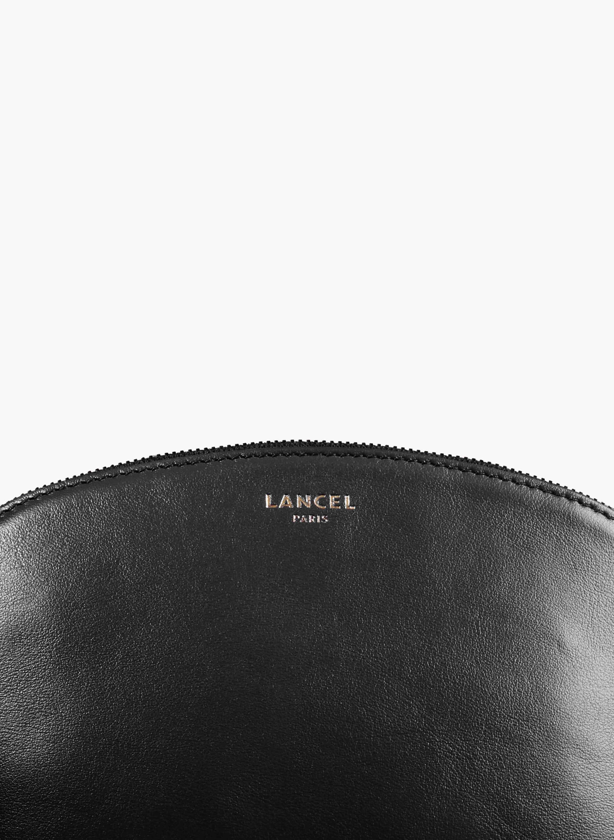 Cosmetische etui van Lancel in leder. LANCEL Zwart