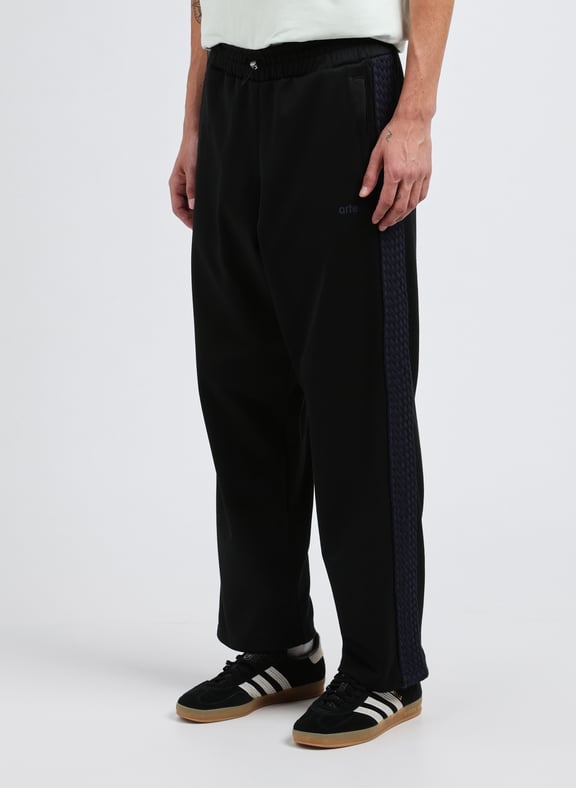 Trousers with braided stripes Black by ARTE ANTWERP ARTE ANTWERP Trousers with braided stripes Black