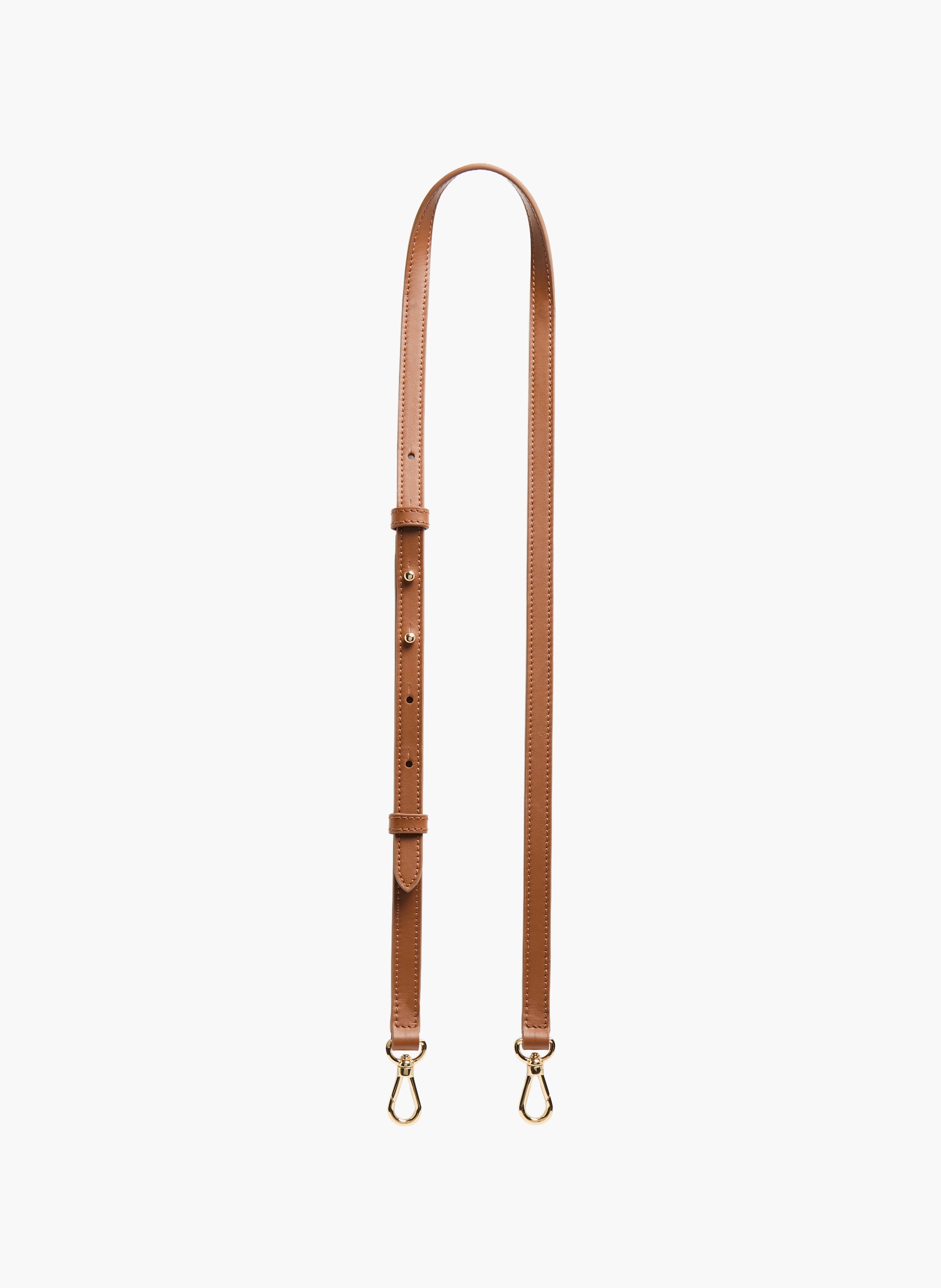 Bandoulière amovible et réglable en cuir. LANCEL Beige
