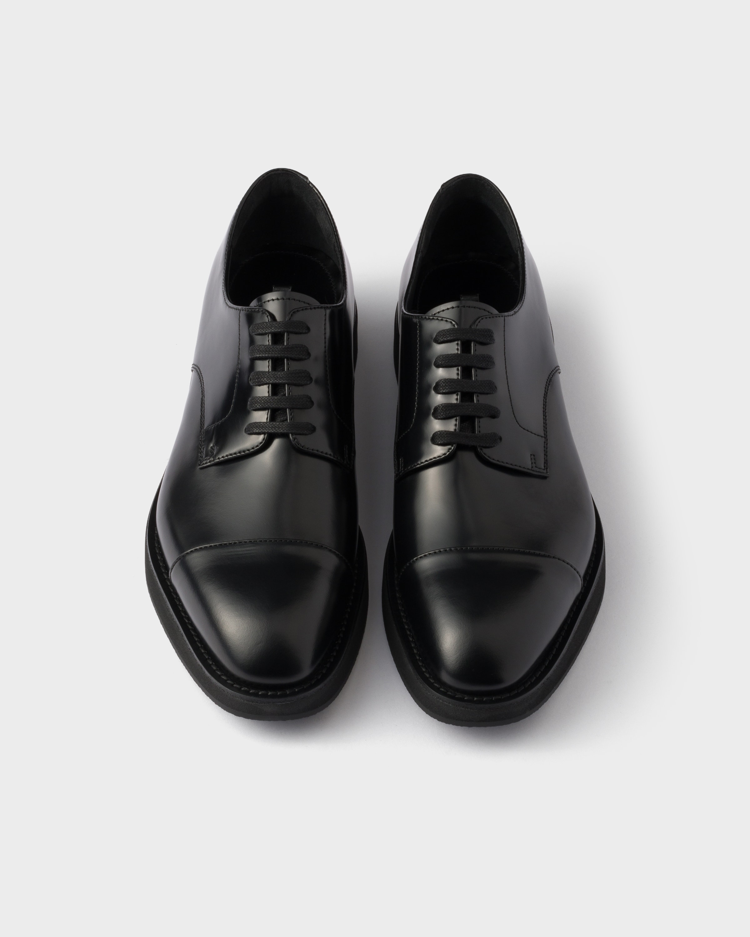 Chaussures à lacets en cuir brossé PRADA Noir