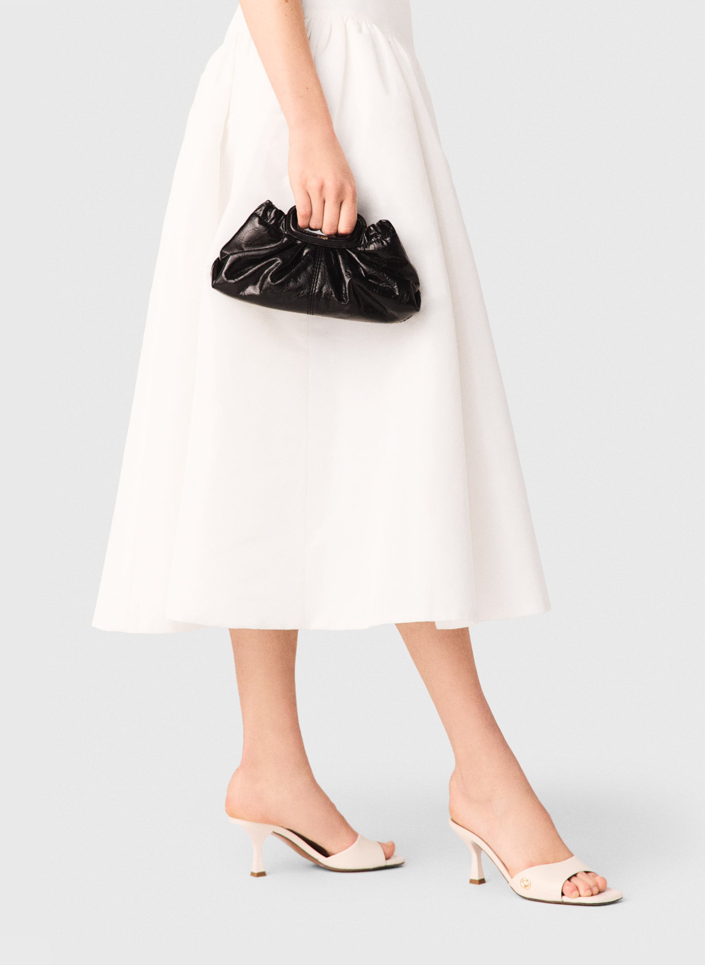 Pochette en cuir craquelé MAJE Noir