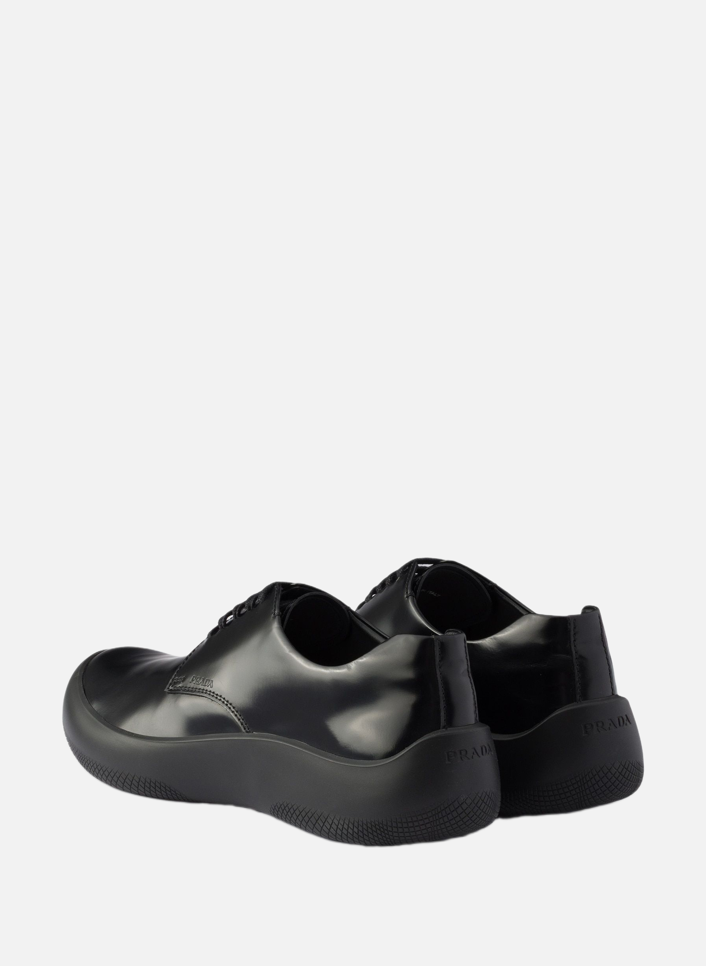 Chaussures à lacets en cuir brossé PRADA Noir
