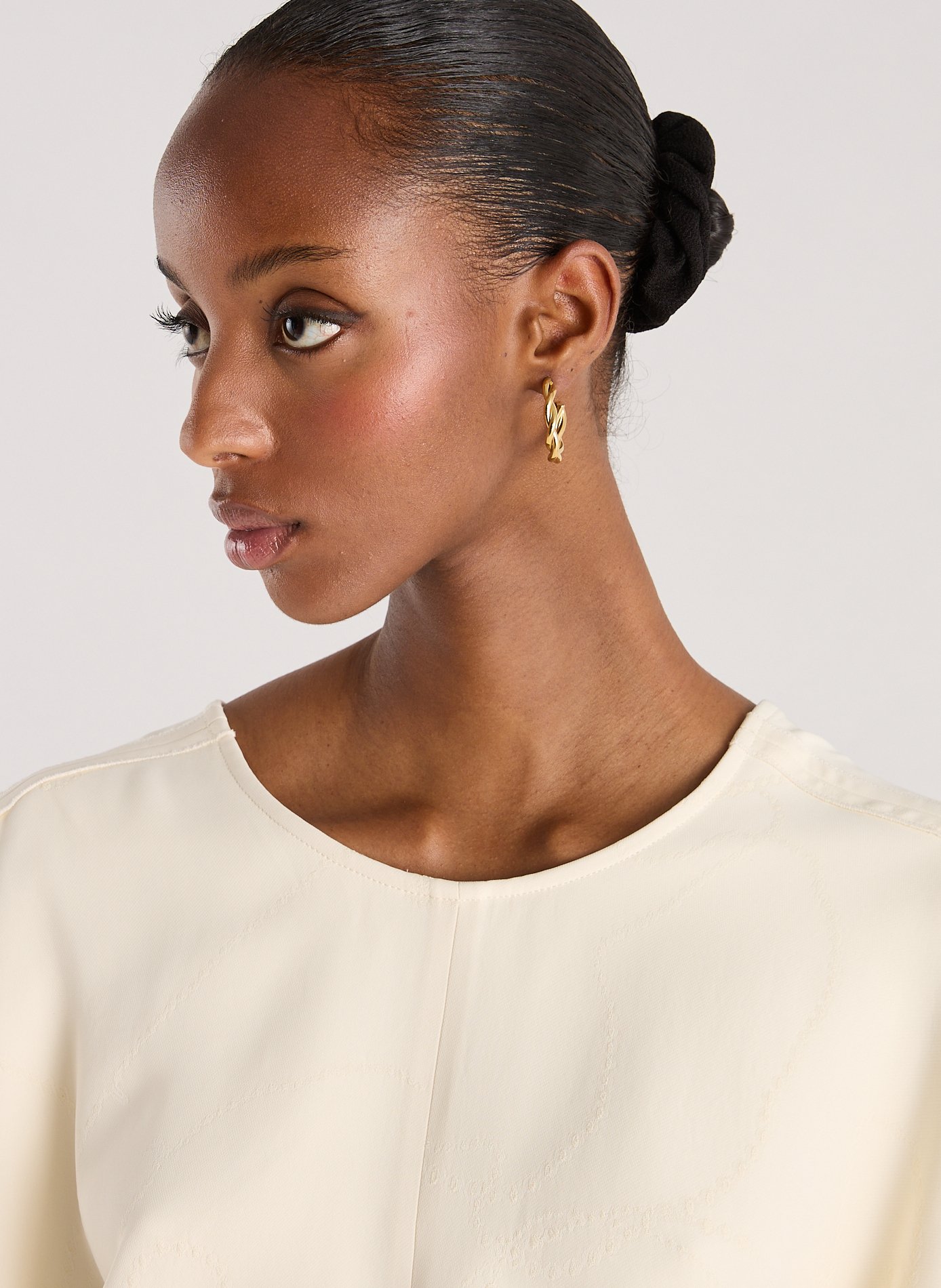 Boucles d&#039;oreille torsadées  AU PRINTEMPS PARIS Doré