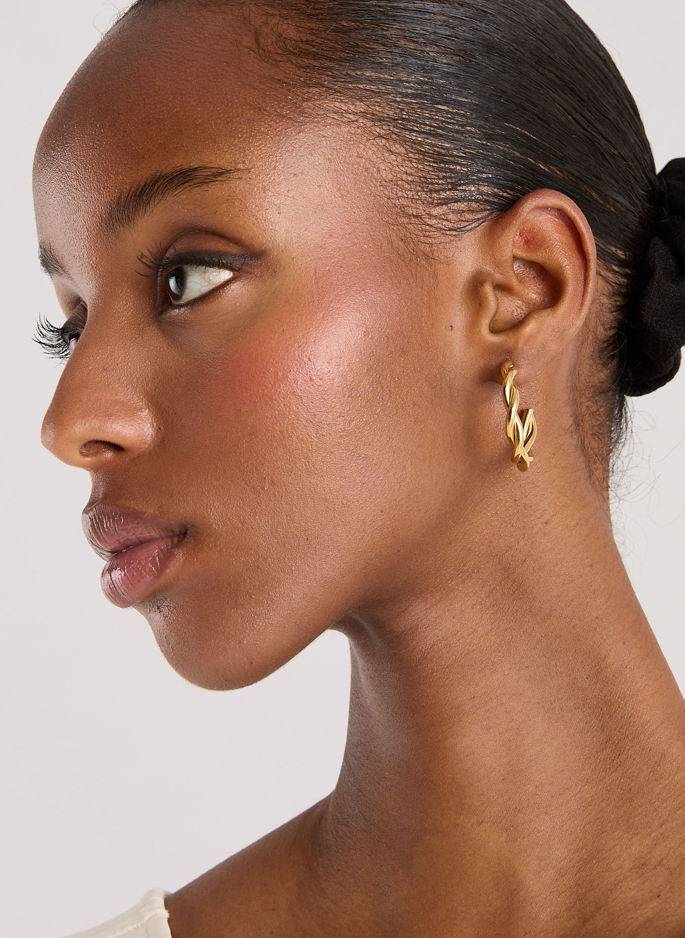 Boucles d&#039;oreille torsadées  AU PRINTEMPS PARIS Doré