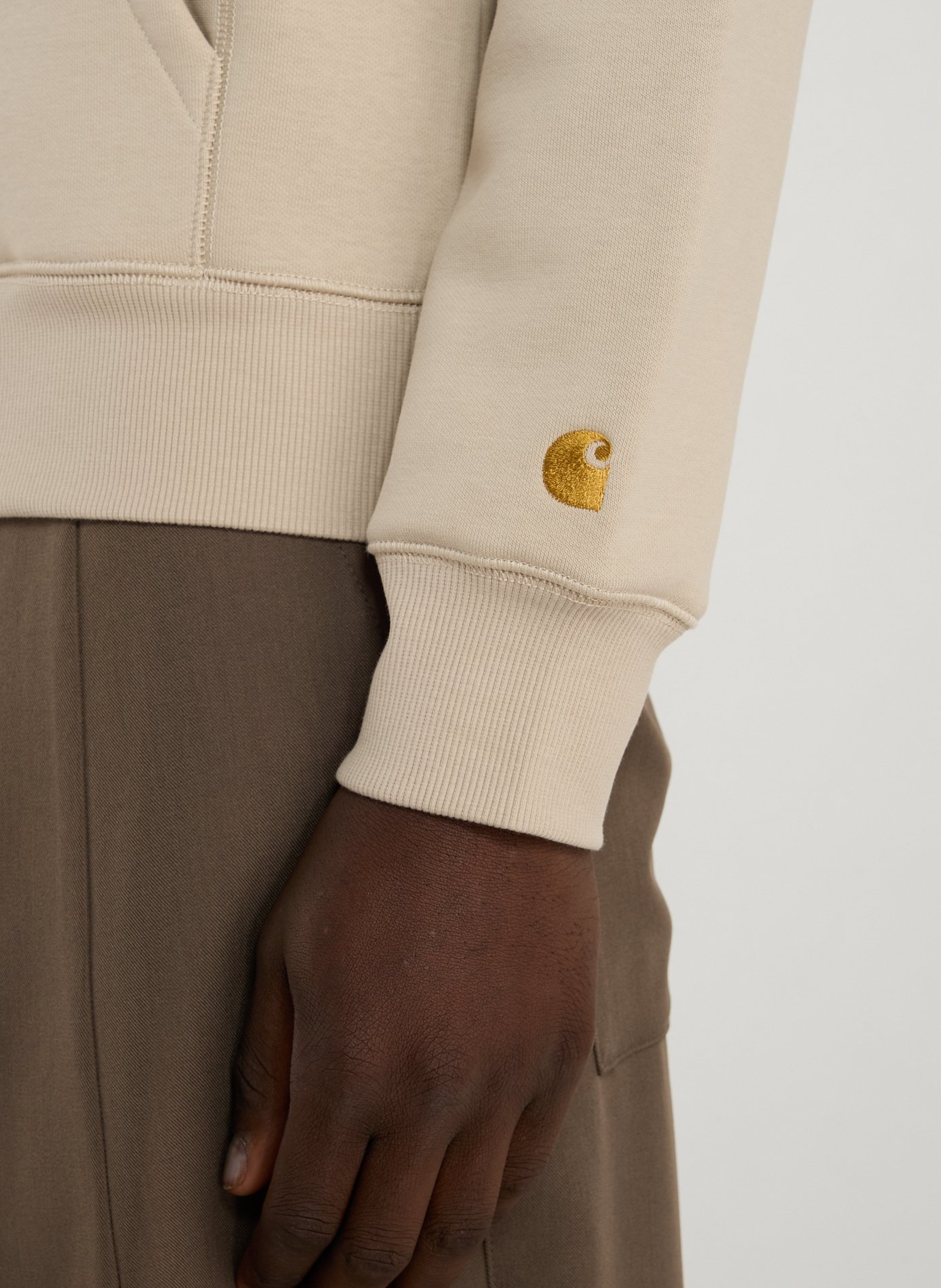 Solid color hooded sweatshirt in blended cotton. CARHARTT WIP Beige