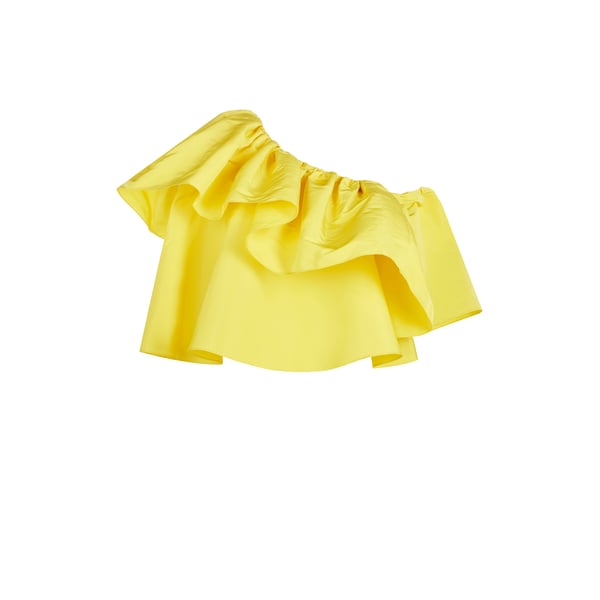 Top asymétrique à volants