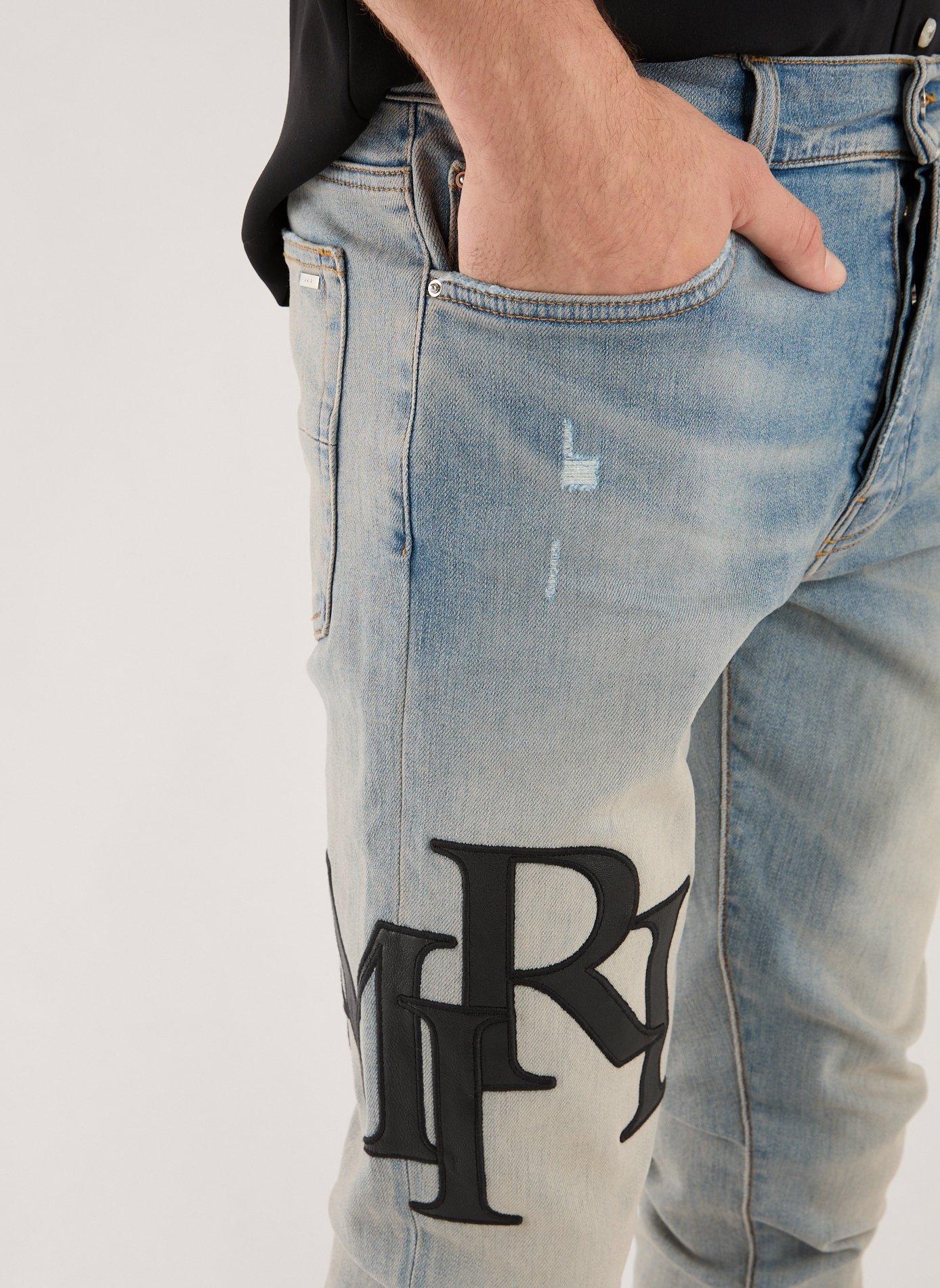 Slim washed jeans with logos Blue