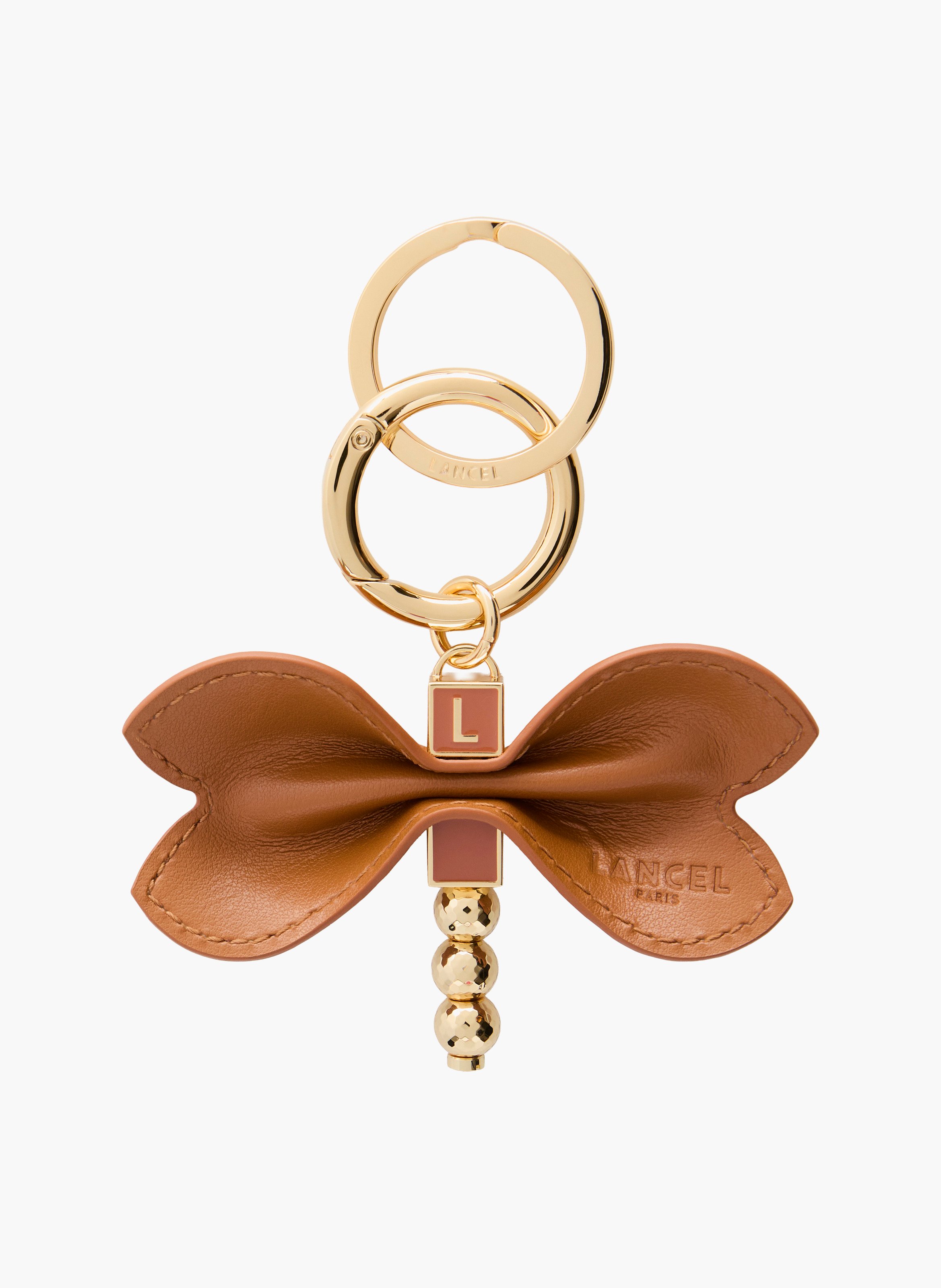 Sleutelhanger libelle van soepel kameelleer met metalen details. LANCEL Bruin