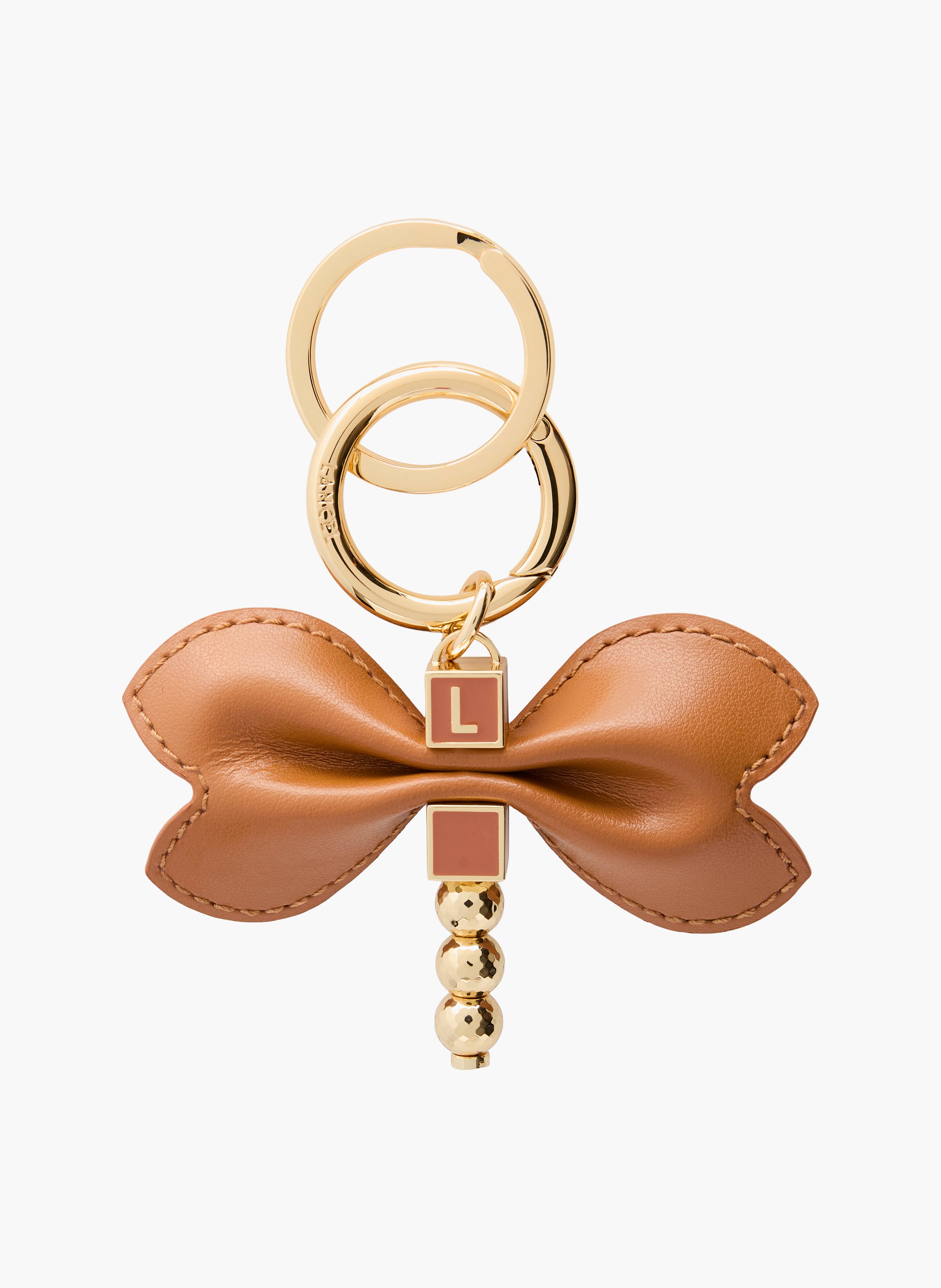Sleutelhanger libelle van soepel kameelleer met metalen details. LANCEL Bruin