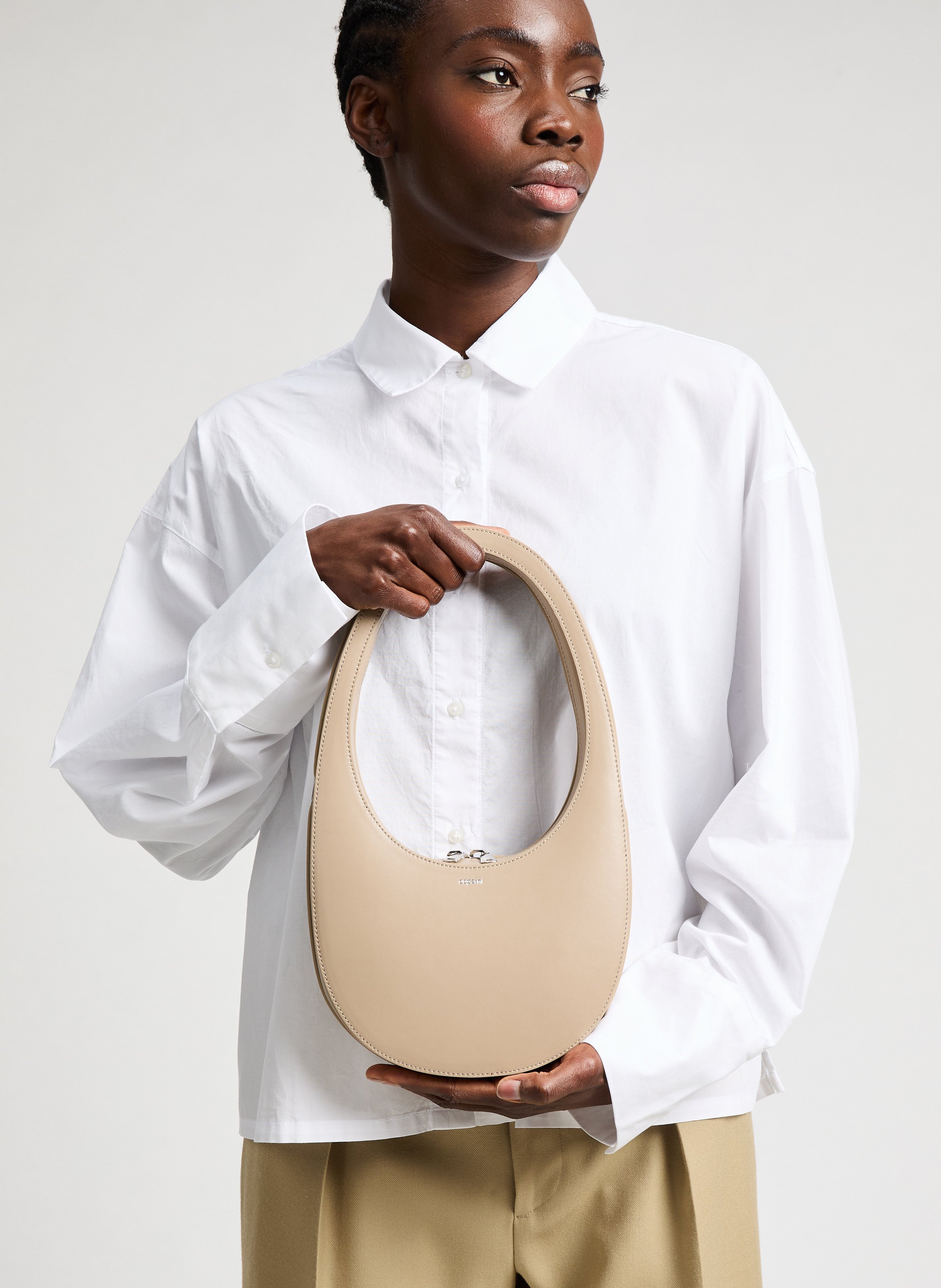 Swipe leather handbag COPERNI Beige