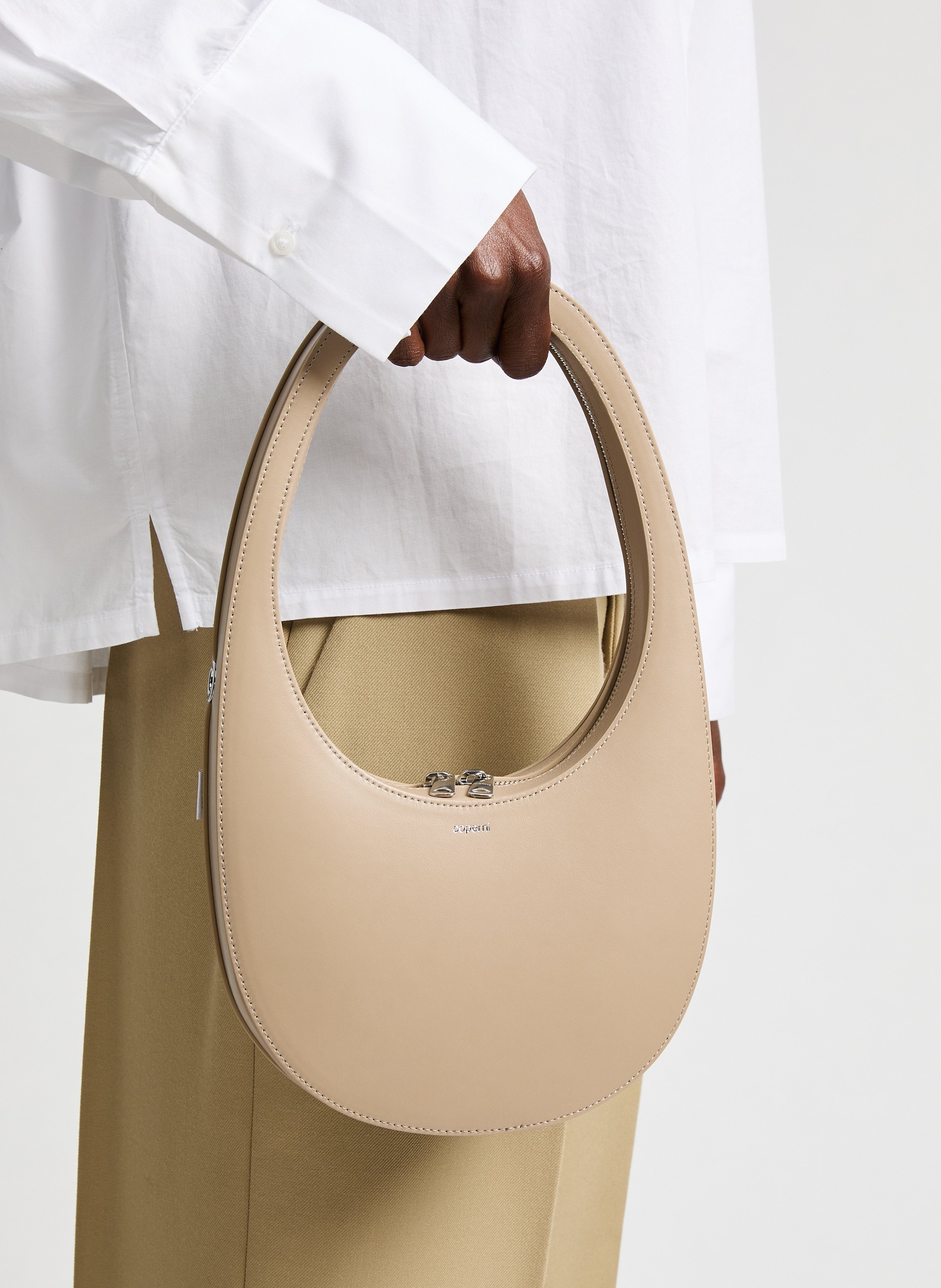 Swipe leather handbag COPERNI Beige