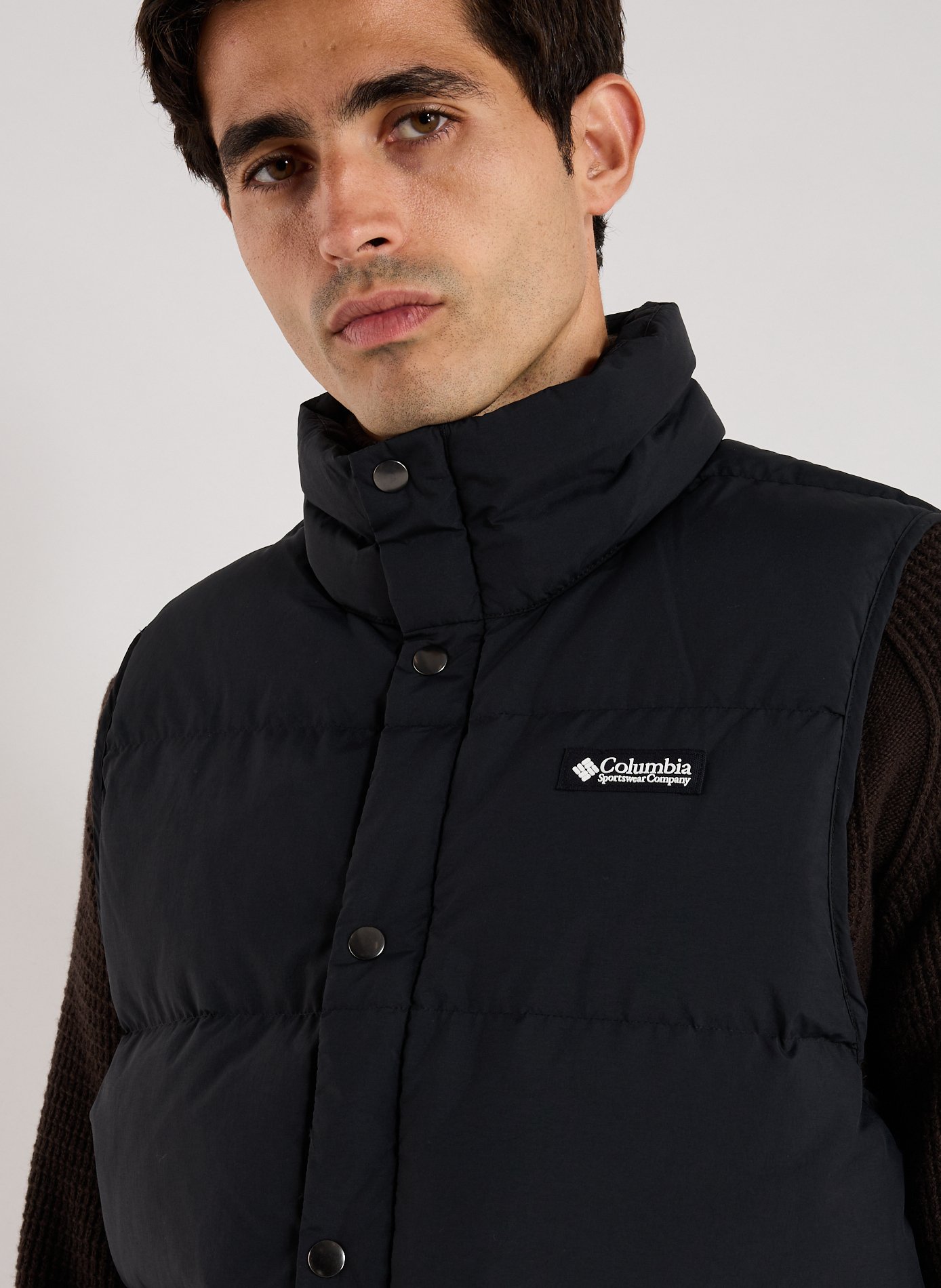 Sleeveless puffer jacket with high collar COLUMBIA Black