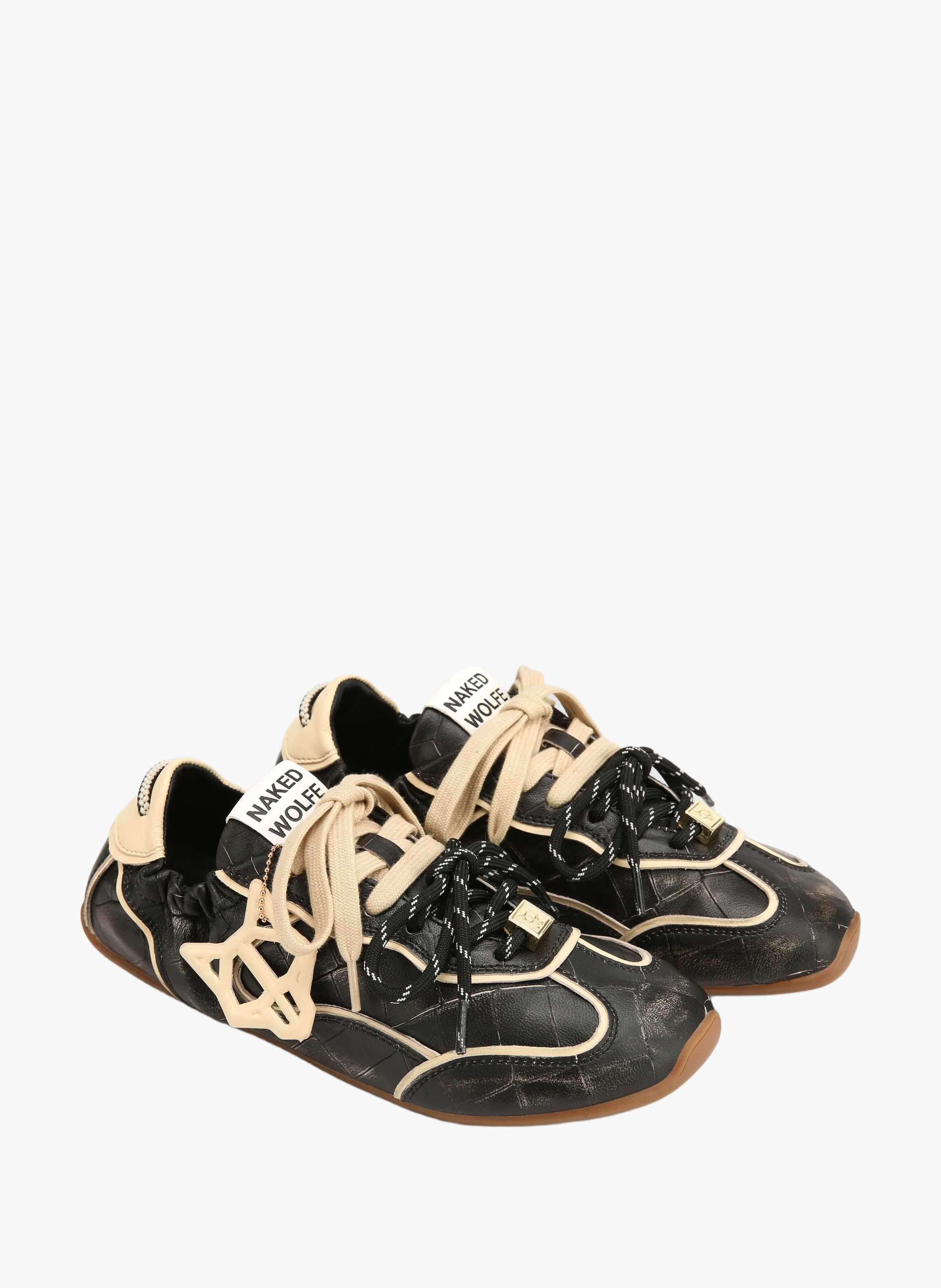 Soul-sneakers van gepatineerd leer met krokodilleneffect NAKED WOLFE Zwart