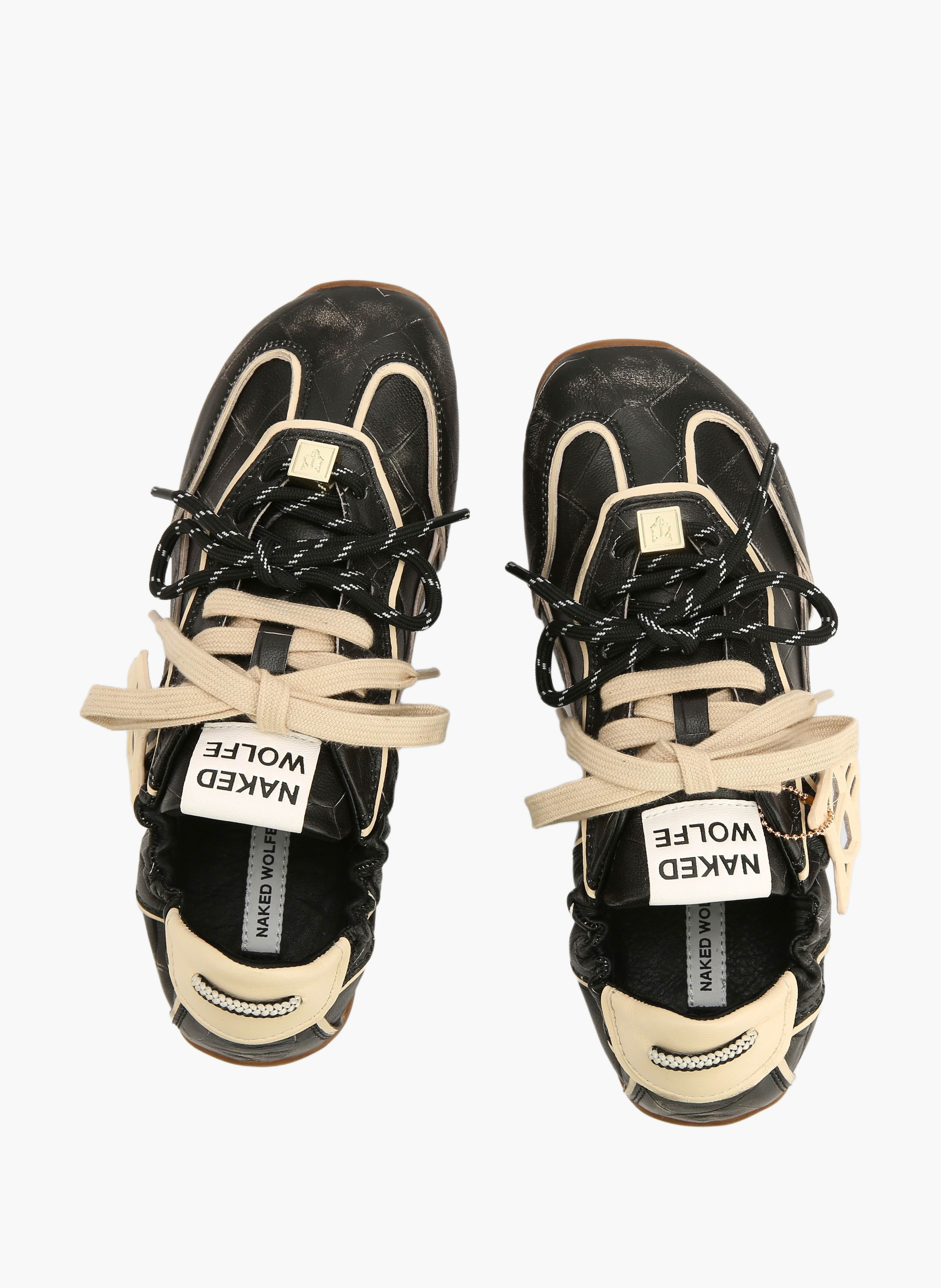 Soul-sneakers van gepatineerd leer met krokodilleneffect NAKED WOLFE Zwart