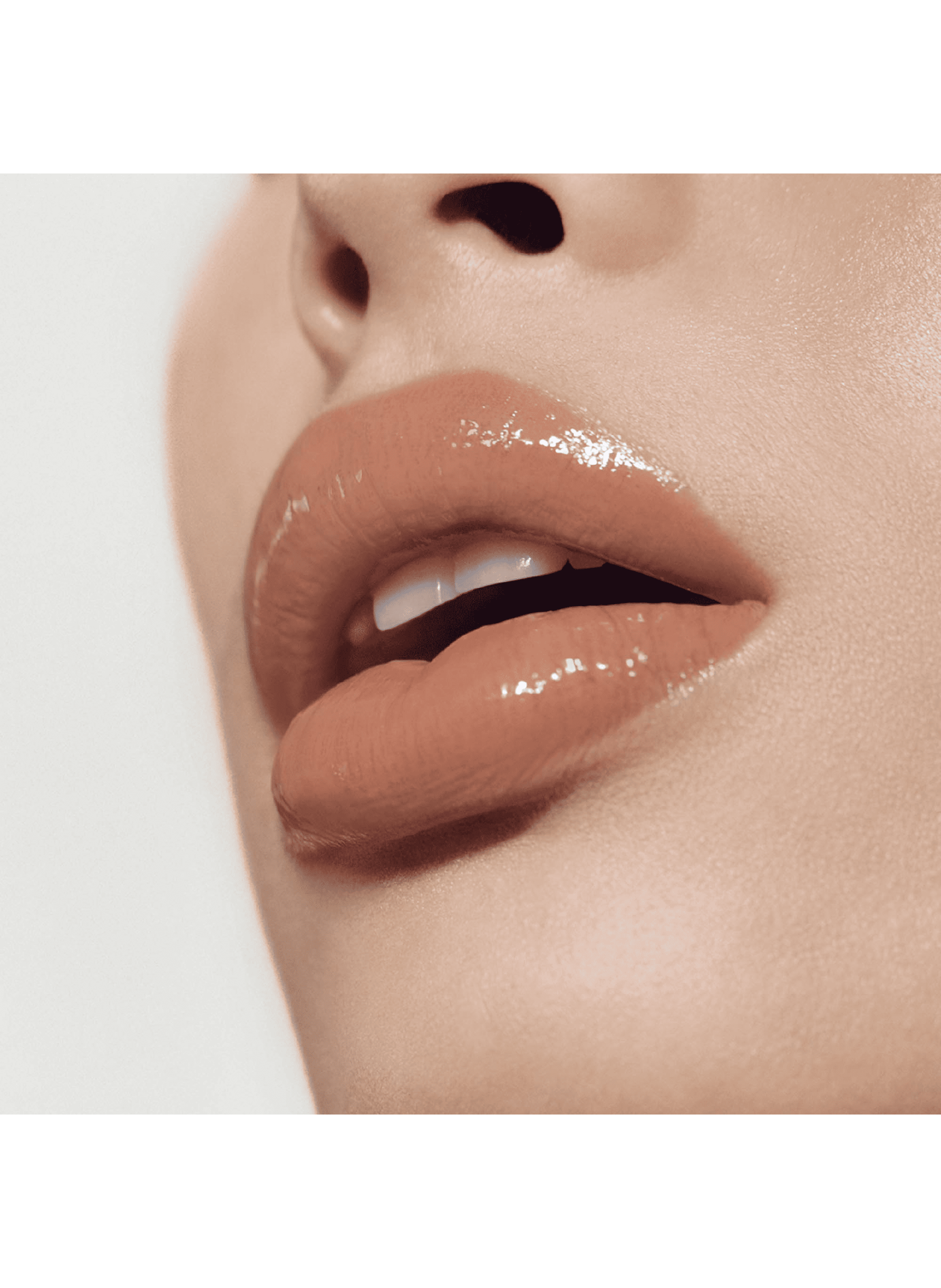 Posh Gloss VICTORIA BECKHAM Tanline